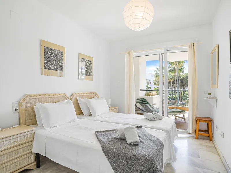 LOCATION! Discover the perfect coastal retreat with this beachfront first-floor apartment located in the prestigious community of Calahonda. This charming flat features two spacious bedrooms and two bathrooms, providing ample space for relaxation and comf