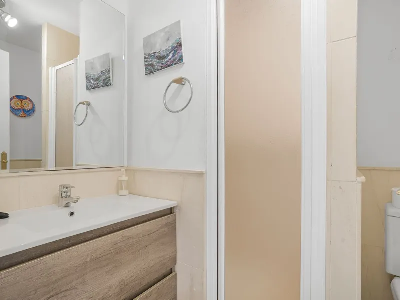 LOCATION! Discover the perfect coastal retreat with this beachfront first-floor apartment located in the prestigious community of Calahonda. This charming flat features two spacious bedrooms and two bathrooms, providing ample space for relaxation and comf