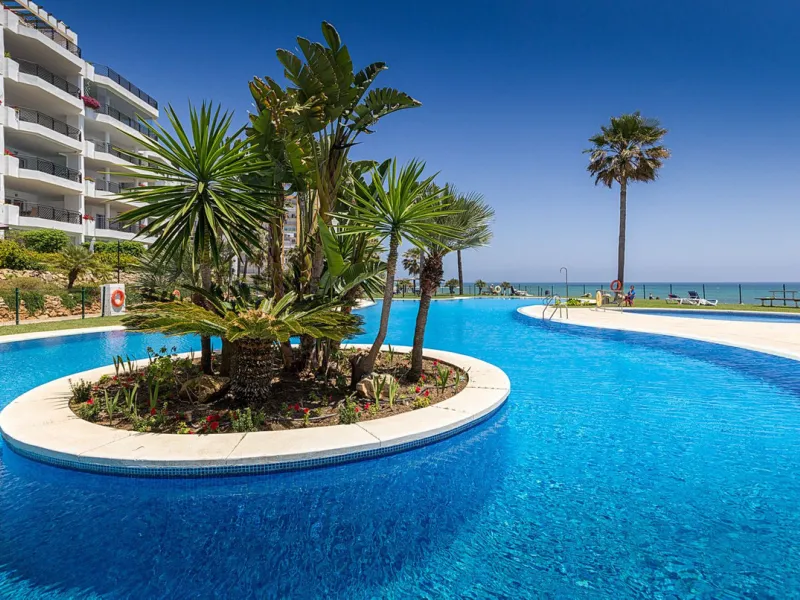 LOCATION! Discover the perfect coastal retreat with this beachfront first-floor apartment located in the prestigious community of Calahonda. This charming flat features two spacious bedrooms and two bathrooms, providing ample space for relaxation and comf