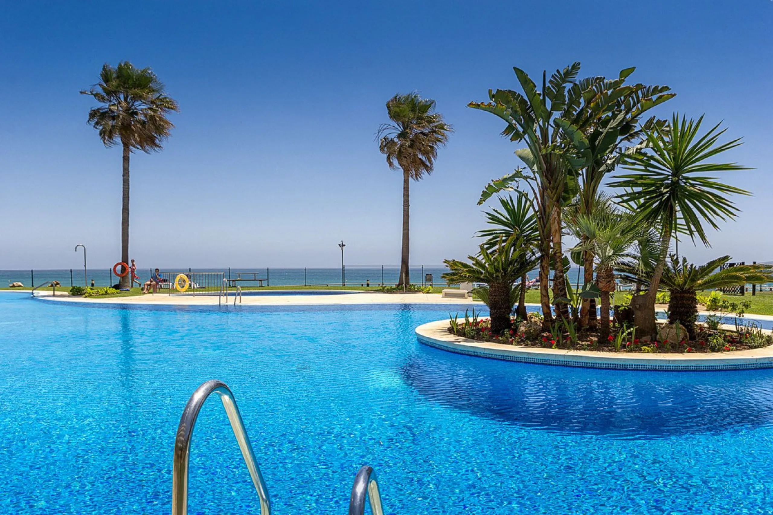 LOCATION! Discover the perfect coastal retreat with this beachfront first-floor apartment located in the prestigious community of Calahonda. This charming flat features two spacious bedrooms and two bathrooms, providing ample space for relaxation and comf