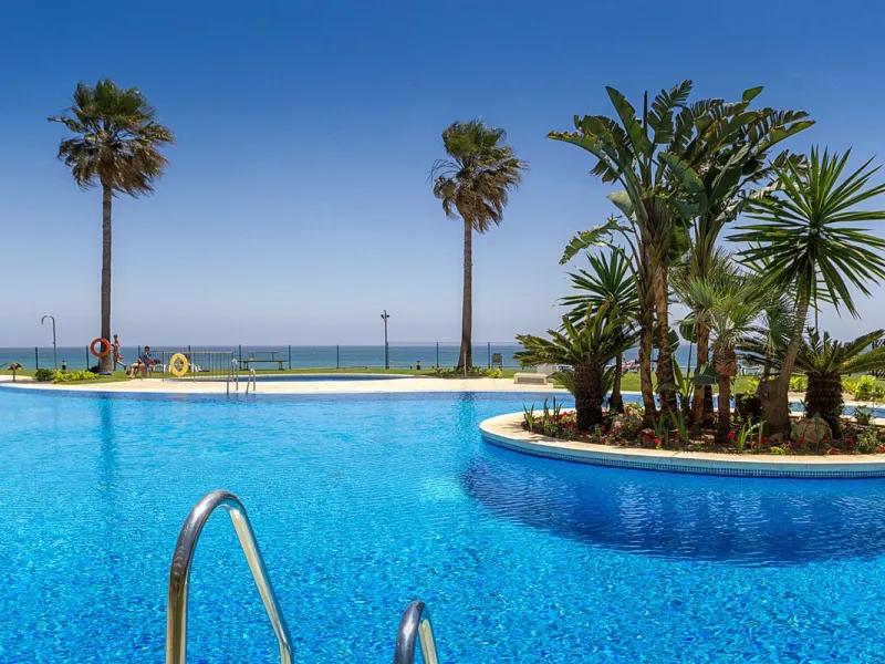 LOCATION! Discover the perfect coastal retreat with this beachfront first-floor apartment located in the prestigious community of Calahonda. This charming flat features two spacious bedrooms and two bathrooms, providing ample space for relaxation and comf