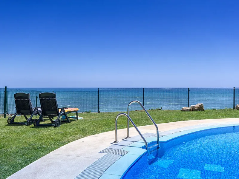 LOCATION! Discover the perfect coastal retreat with this beachfront first-floor apartment located in the prestigious community of Calahonda. This charming flat features two spacious bedrooms and two bathrooms, providing ample space for relaxation and comf