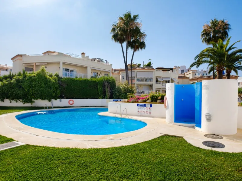 Stylish 2-Bedroom Apartment with Pool and Garden Views in Central Nerja – €550,000