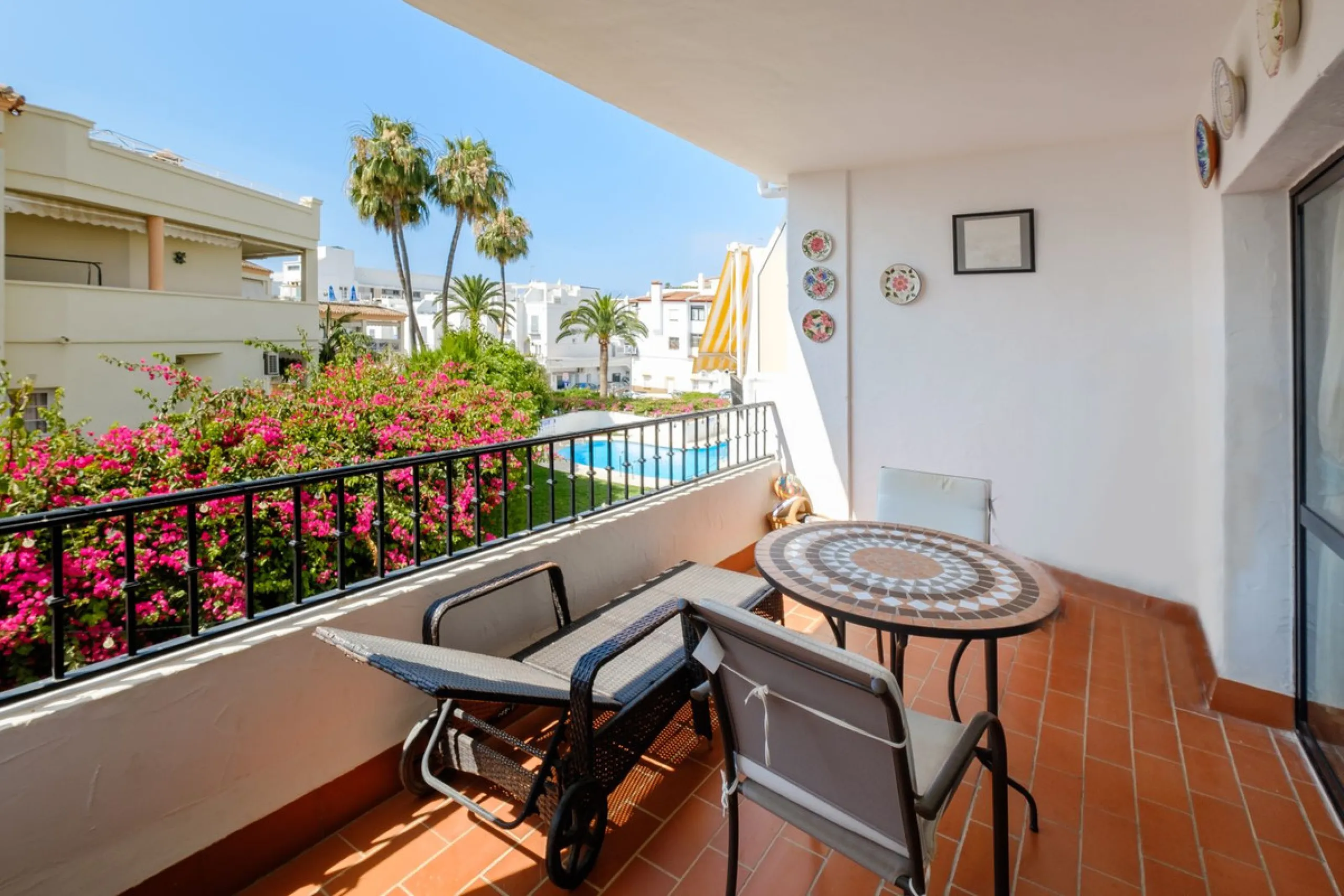 Stylish 2-Bedroom Apartment with Pool and Garden Views in Central Nerja – €550,000