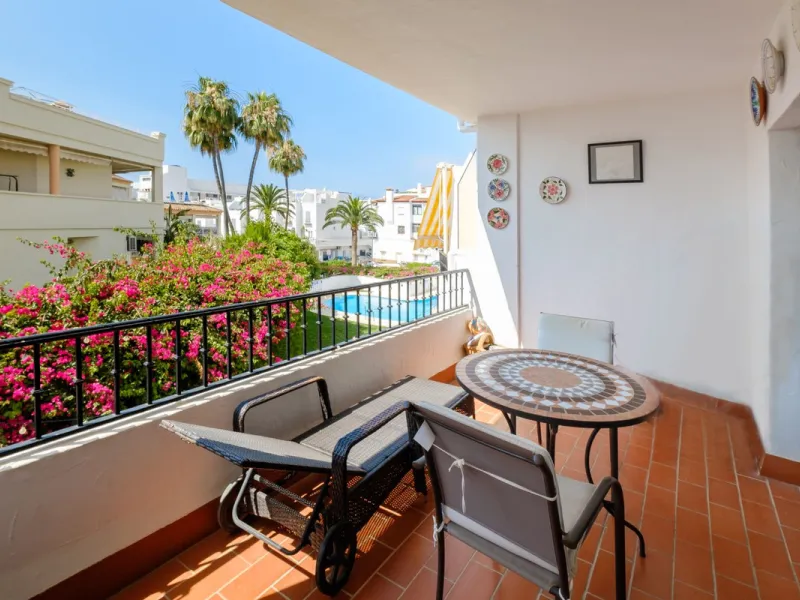 Stylish 2-Bedroom Apartment with Pool and Garden Views in Central Nerja – €550,000