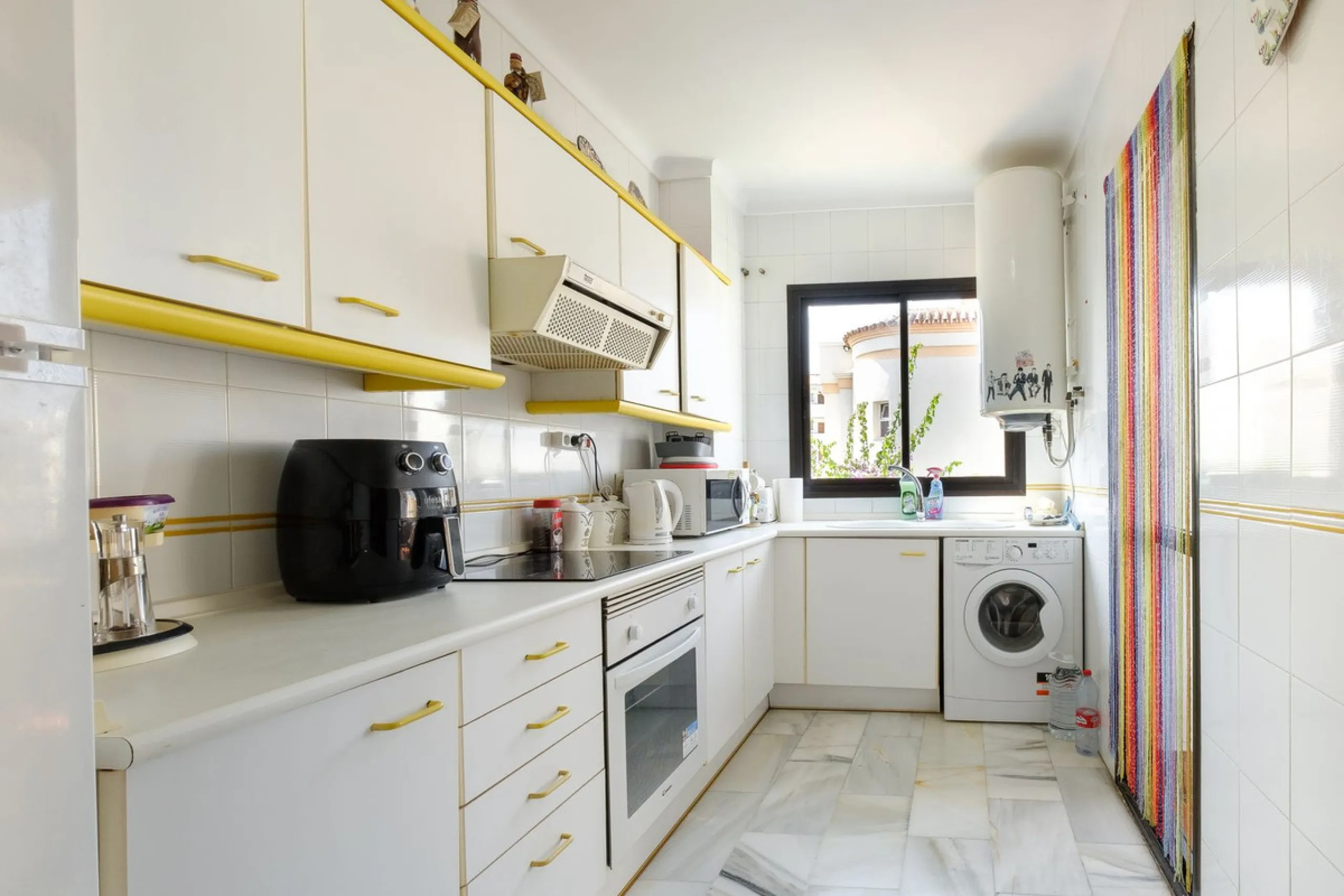 Stylish 2-Bedroom Apartment with Pool and Garden Views in Central Nerja – €550,000