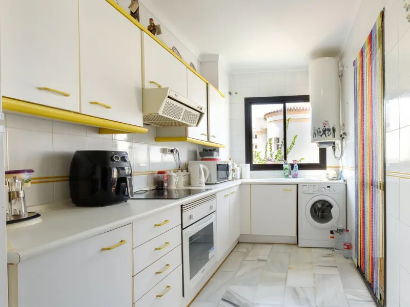 Stylish 2-Bedroom Apartment with Pool and Garden Views in Central Nerja – €550,000