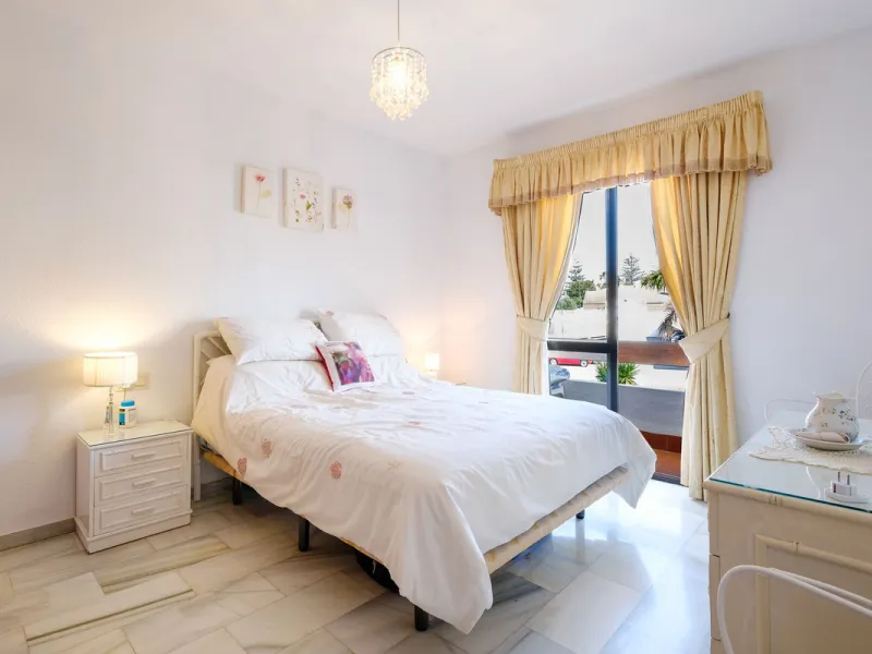 Stylish 2-Bedroom Apartment with Pool and Garden Views in Central Nerja – €550,000