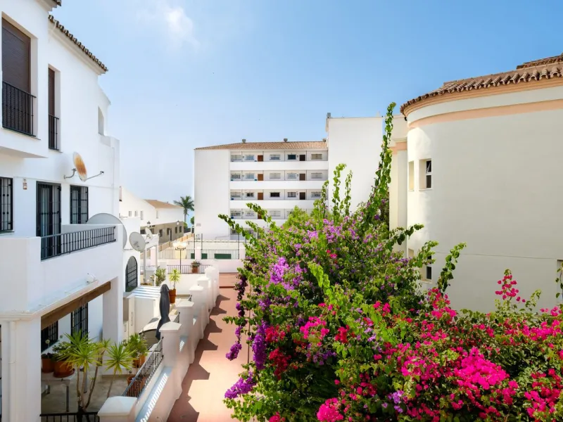 Stylish 2-Bedroom Apartment with Pool and Garden Views in Central Nerja – €550,000