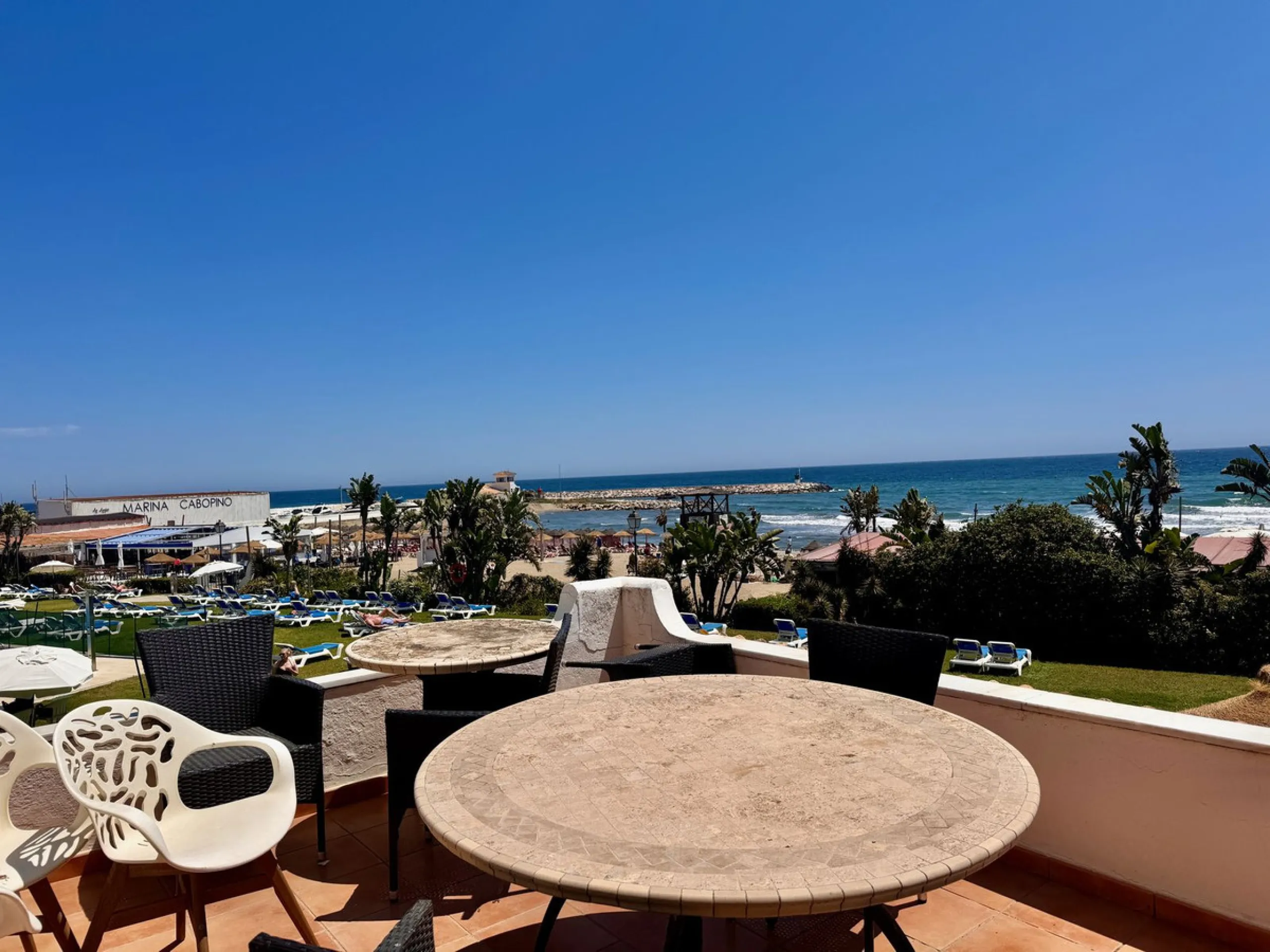 This is a very unique property right on the one of the best beaches in Marbella. This property is really unlike almost an other property in the Cabopino Port complex. The property offers the private and open upper terraces of a penthouse with a more socia