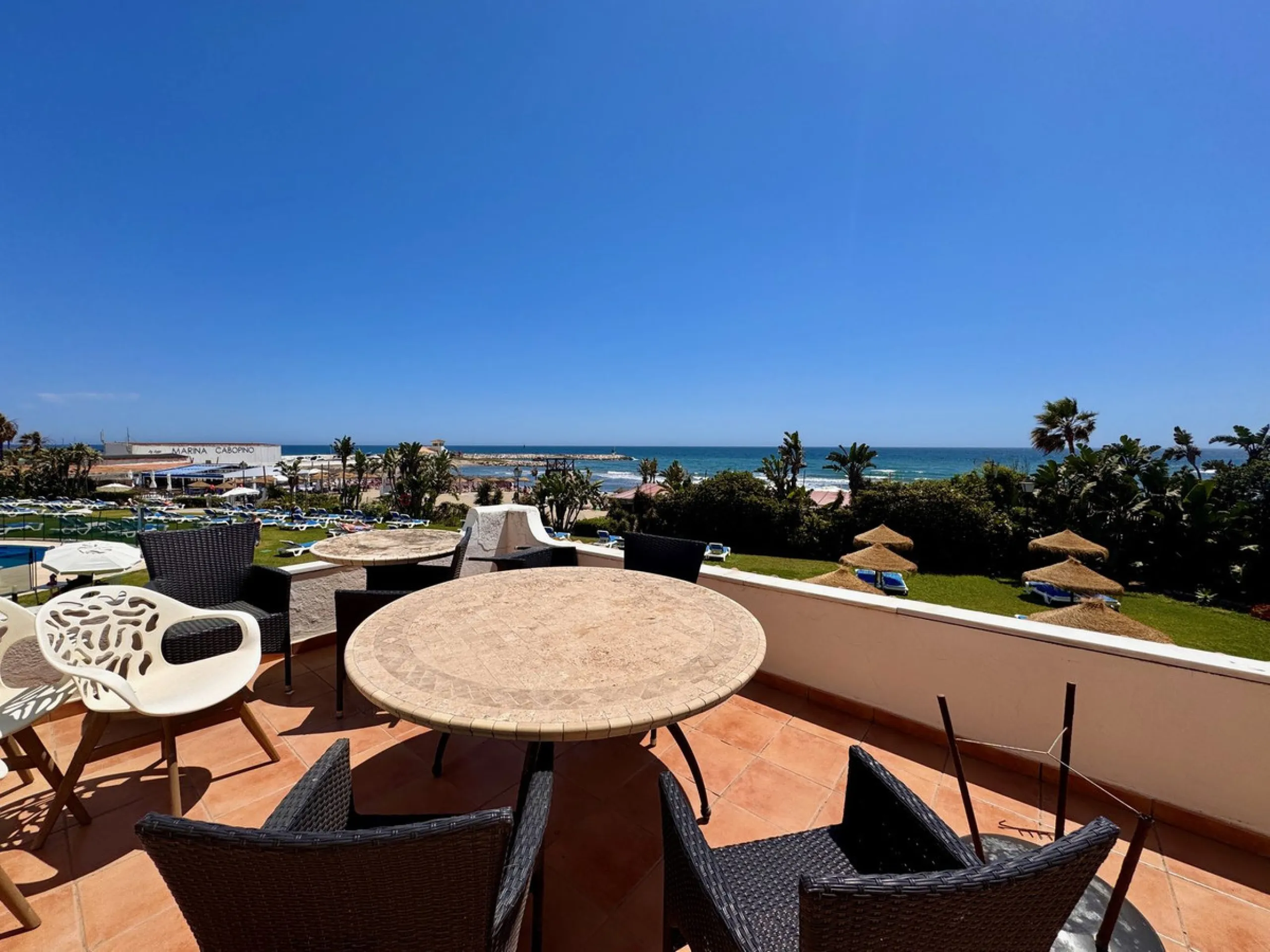 This is a very unique property right on the one of the best beaches in Marbella. This property is really unlike almost an other property in the Cabopino Port complex. The property offers the private and open upper terraces of a penthouse with a more socia