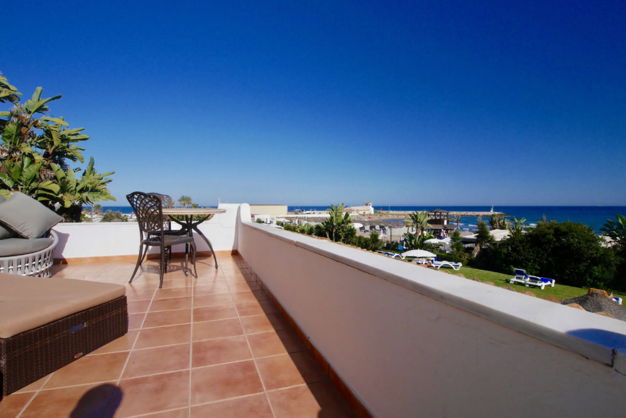 This is a very unique property right on the one of the best beaches in Marbella. This property is really unlike almost an other property in the Cabopino Port complex. The property offers the private and open upper terraces of a penthouse with a more socia