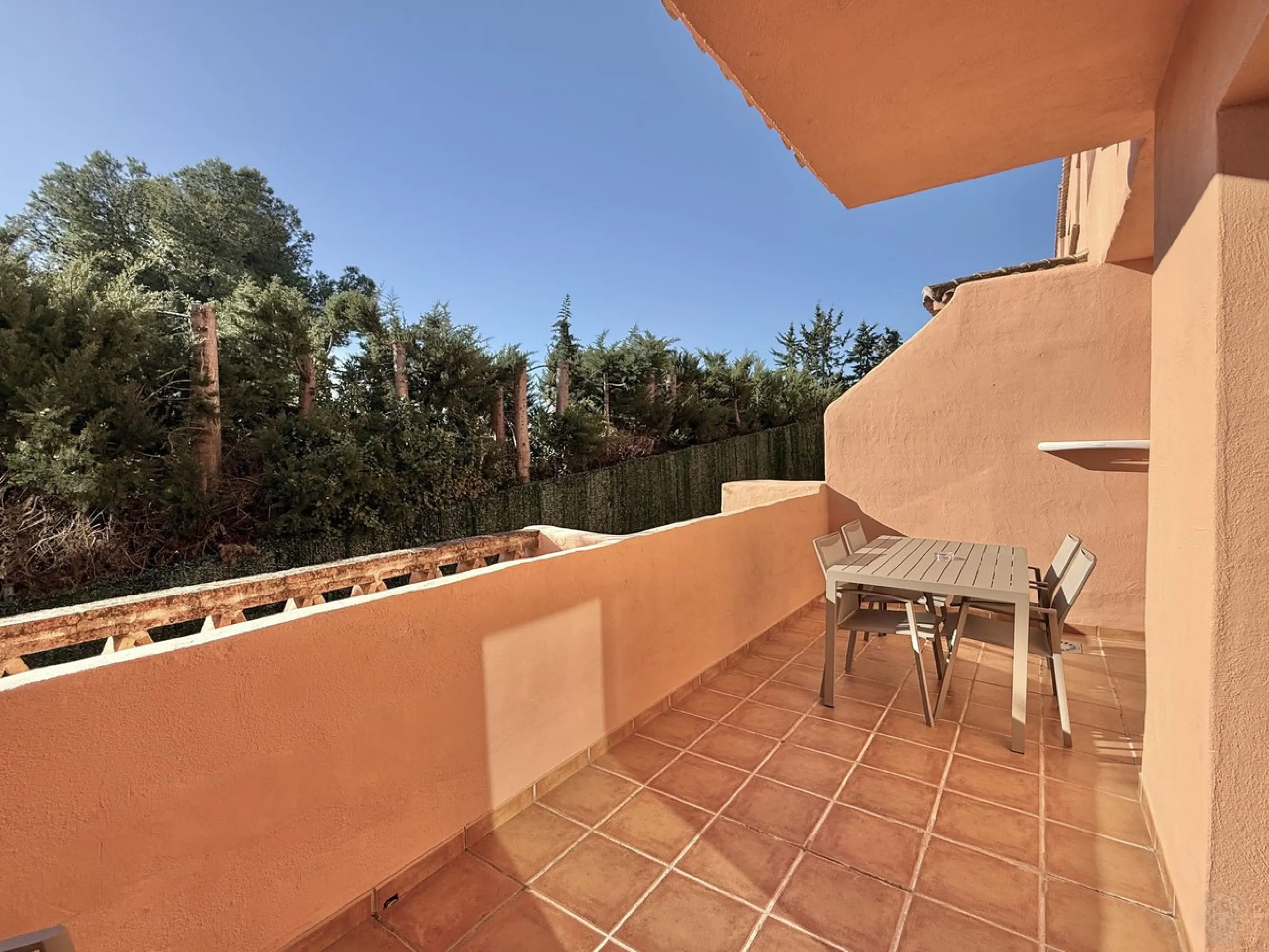 Contemporary first floor 2 bed 2 bath apartment on the edge of El Paraíso Golf course.