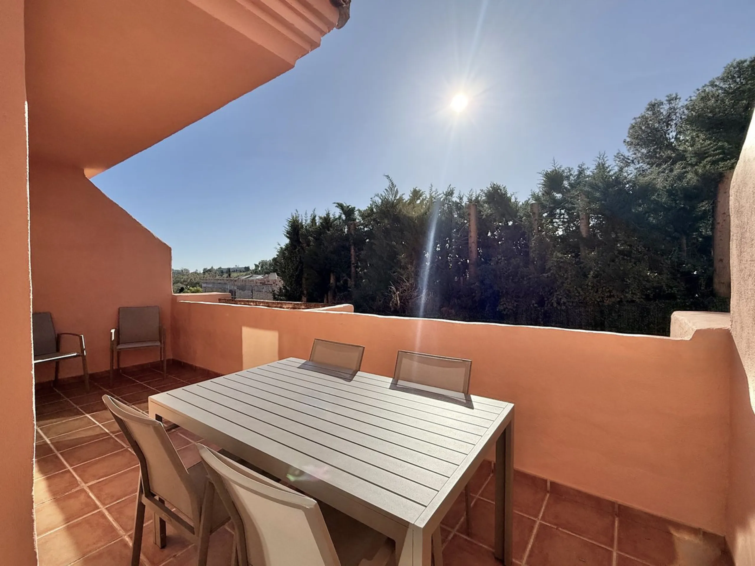 Contemporary first floor 2 bed 2 bath apartment on the edge of El Paraíso Golf course.