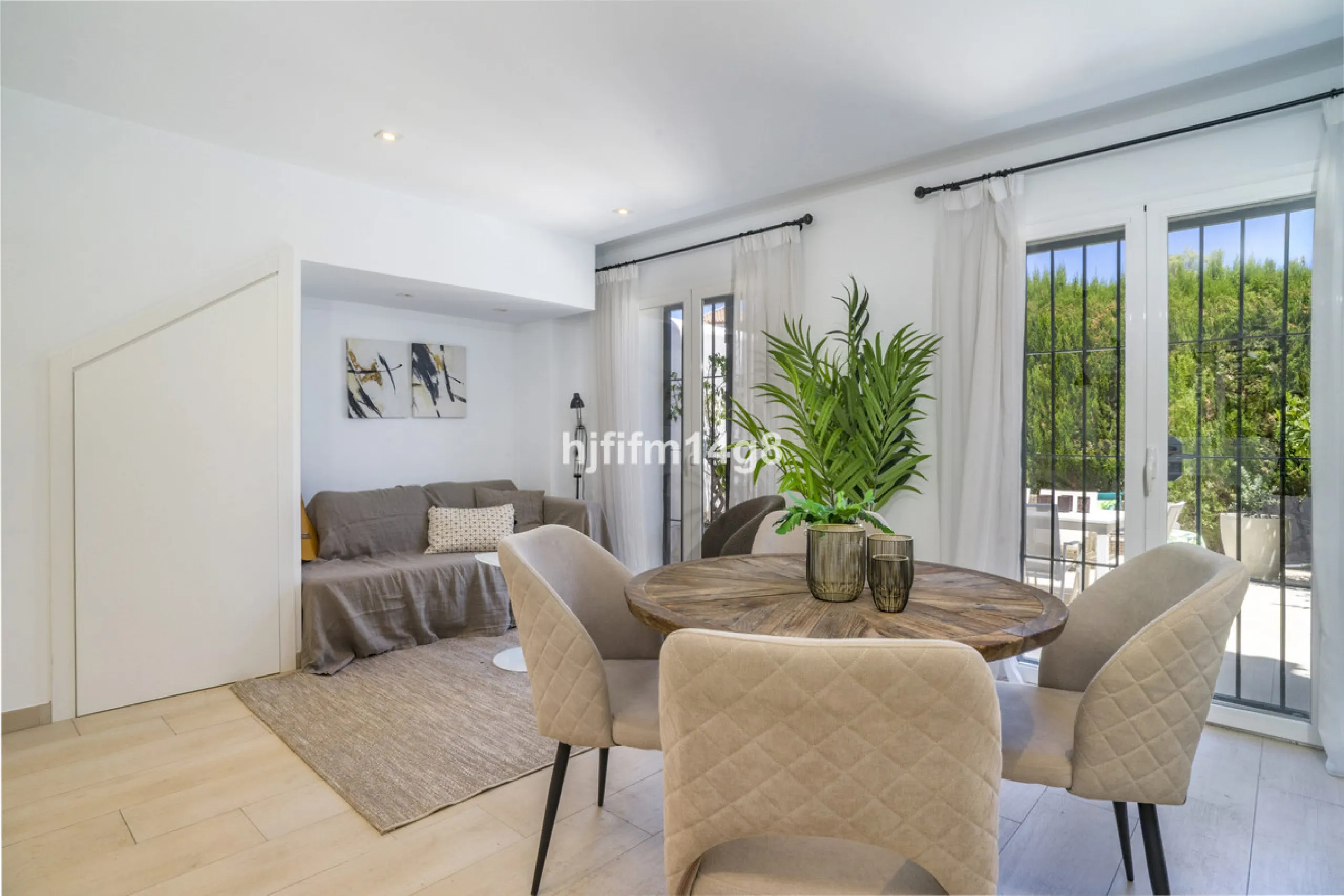 Nestled in the heart of the sought-after El Naranjal urbanisation, this delightful townhouse blends traditional Andalusian character with modern comfort. Located within a secure gated community renowned for its cobbled streets, picturesque patios, and vib