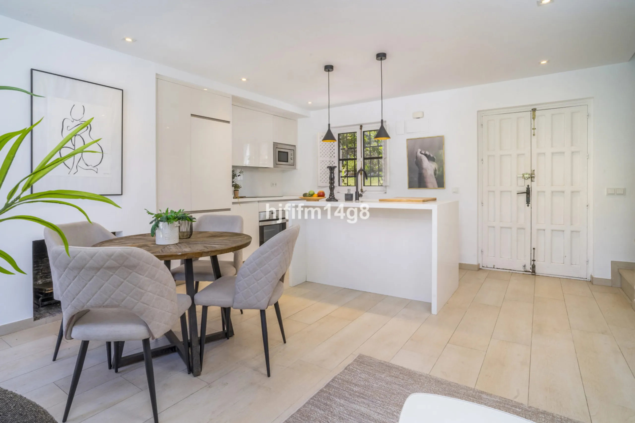 Nestled in the heart of the sought-after El Naranjal urbanisation, this delightful townhouse blends traditional Andalusian character with modern comfort. Located within a secure gated community renowned for its cobbled streets, picturesque patios, and vib