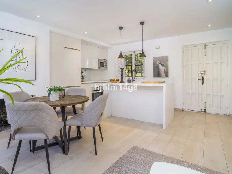 Nestled in the heart of the sought-after El Naranjal urbanisation, this delightful townhouse blends traditional Andalusian character with modern comfort. Located within a secure gated community renowned for its cobbled streets, picturesque patios, and vib