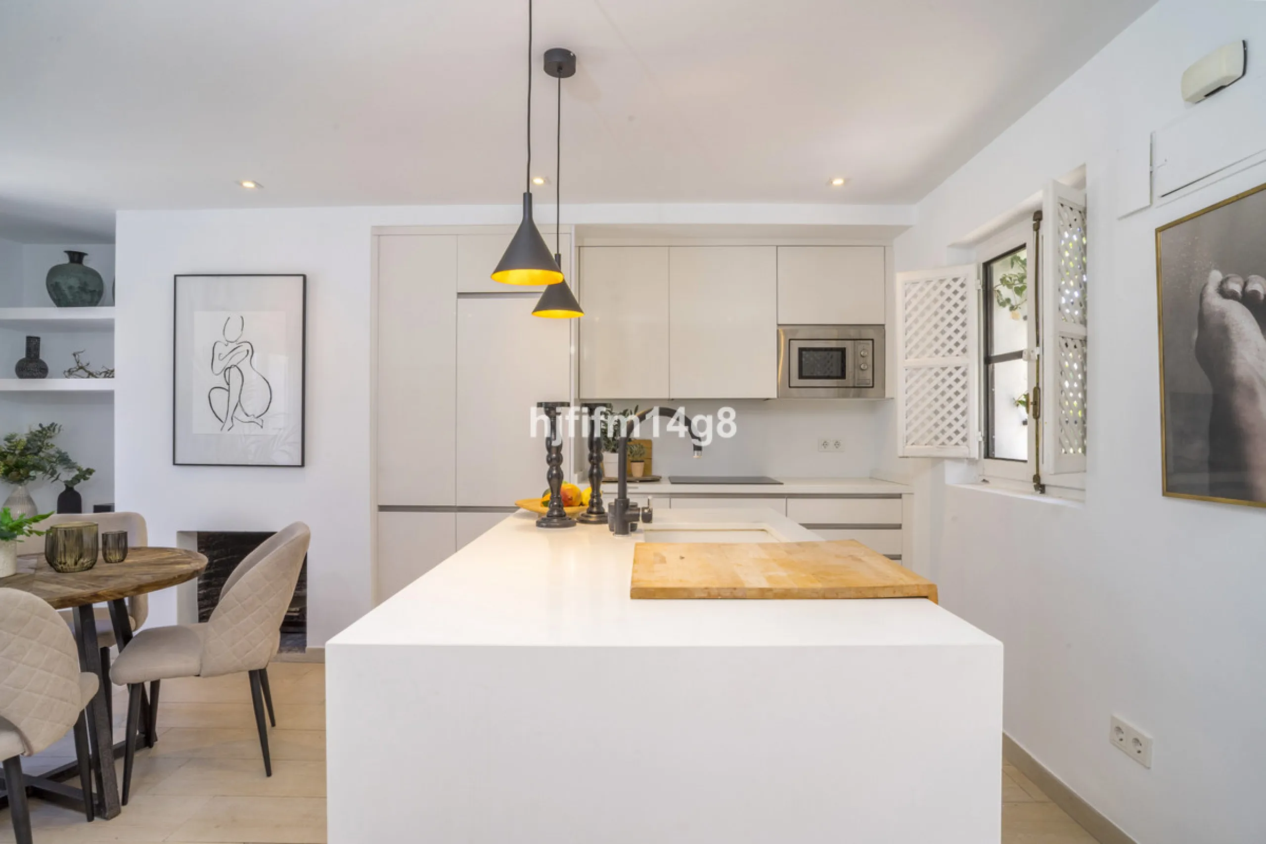 Nestled in the heart of the sought-after El Naranjal urbanisation, this delightful townhouse blends traditional Andalusian character with modern comfort. Located within a secure gated community renowned for its cobbled streets, picturesque patios, and vib