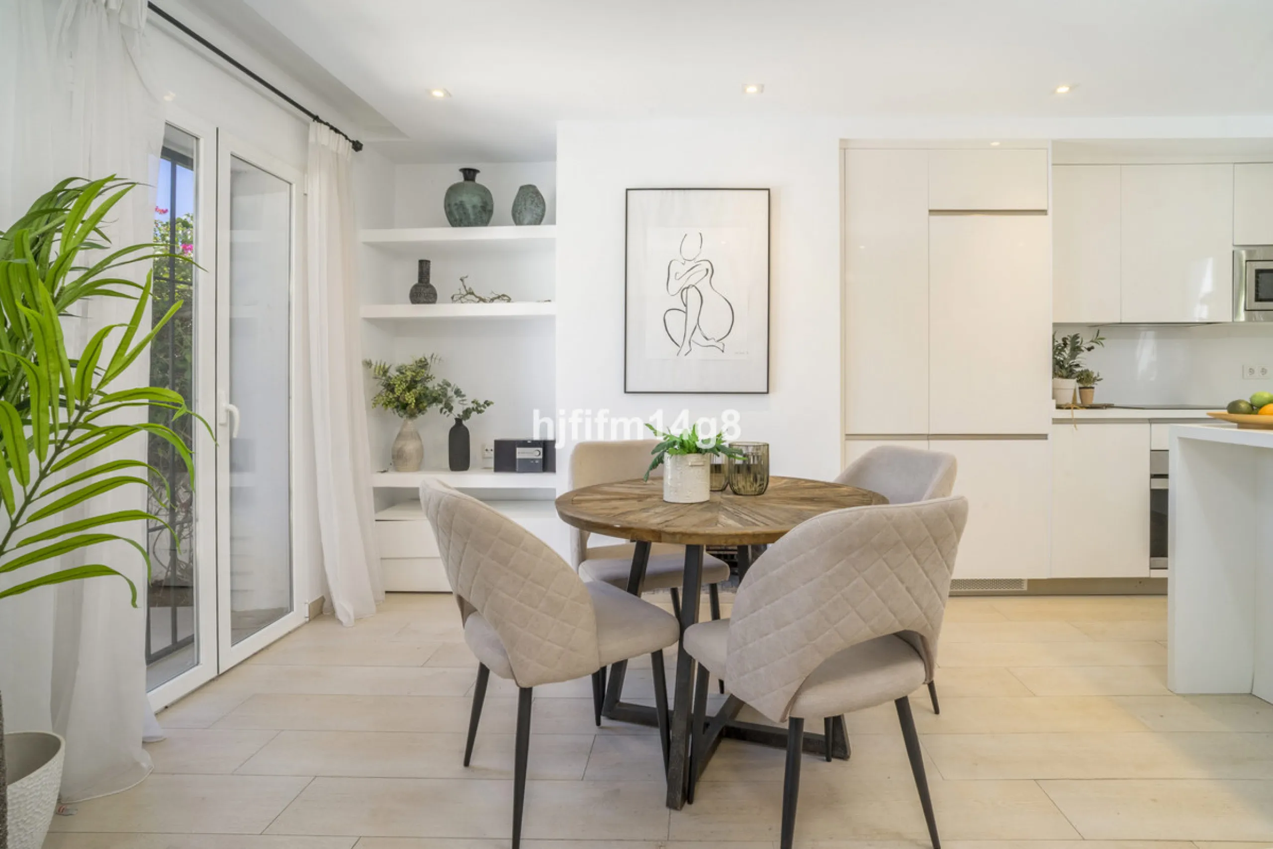 Nestled in the heart of the sought-after El Naranjal urbanisation, this delightful townhouse blends traditional Andalusian character with modern comfort. Located within a secure gated community renowned for its cobbled streets, picturesque patios, and vib