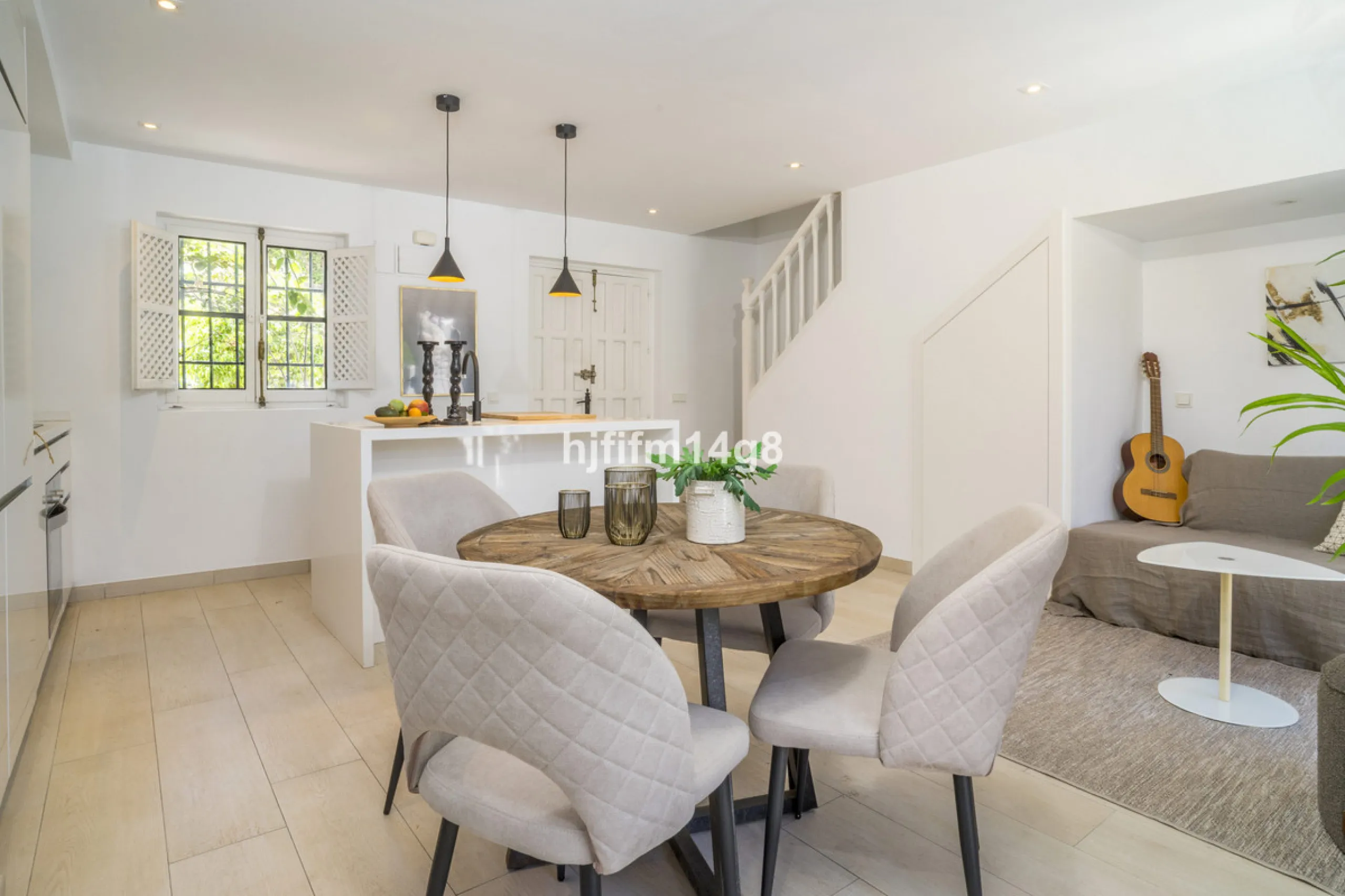 Nestled in the heart of the sought-after El Naranjal urbanisation, this delightful townhouse blends traditional Andalusian character with modern comfort. Located within a secure gated community renowned for its cobbled streets, picturesque patios, and vib