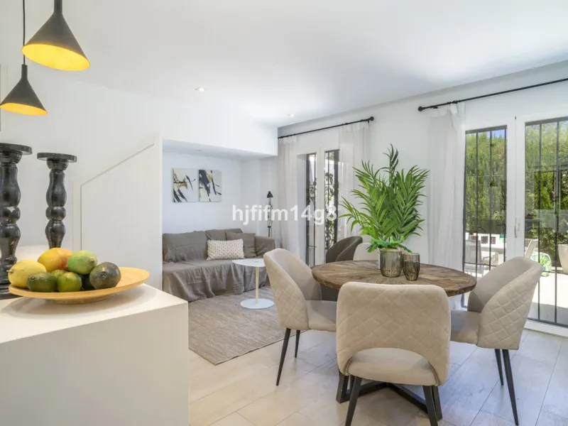 Nestled in the heart of the sought-after El Naranjal urbanisation, this delightful townhouse blends traditional Andalusian character with modern comfort. Located within a secure gated community renowned for its cobbled streets, picturesque patios, and vib
