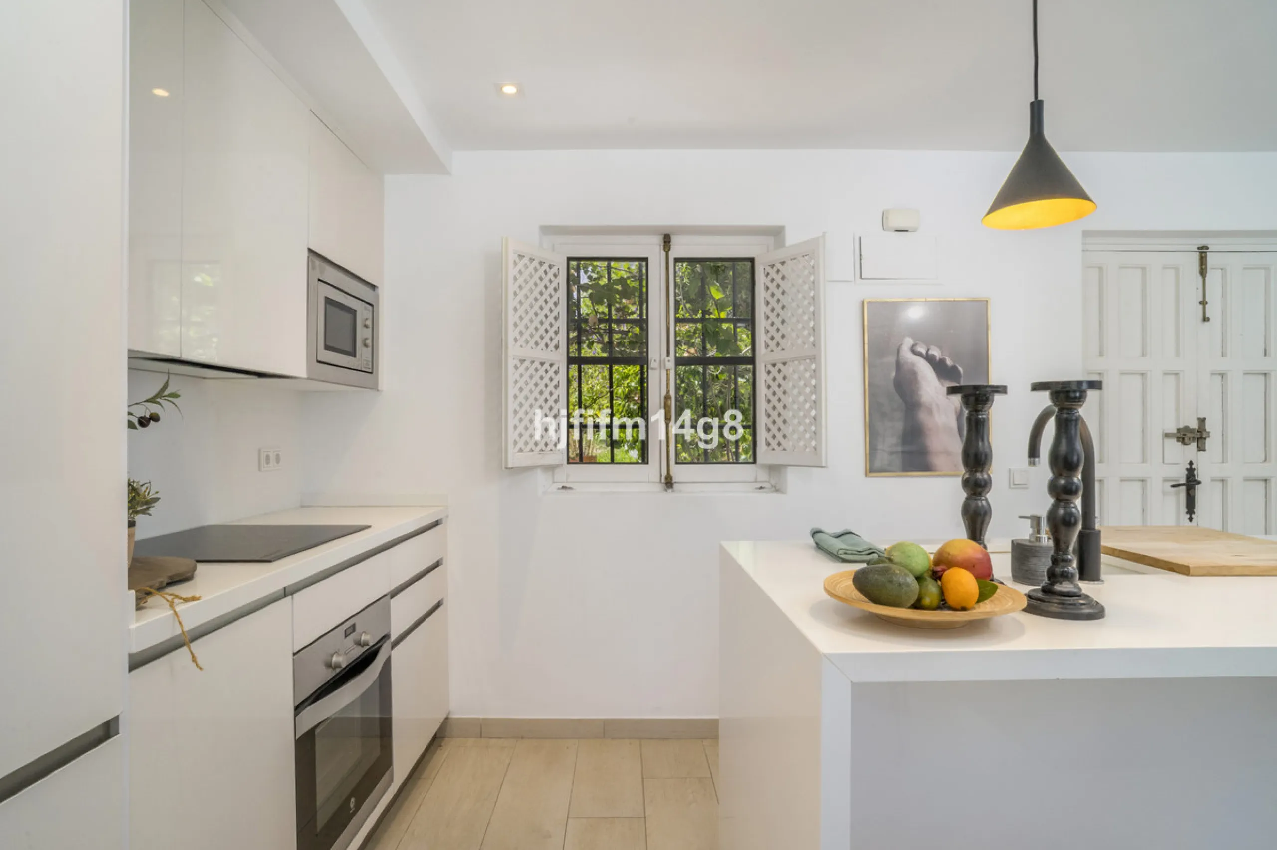 Nestled in the heart of the sought-after El Naranjal urbanisation, this delightful townhouse blends traditional Andalusian character with modern comfort. Located within a secure gated community renowned for its cobbled streets, picturesque patios, and vib