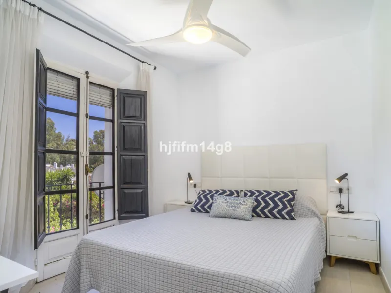 Nestled in the heart of the sought-after El Naranjal urbanisation, this delightful townhouse blends traditional Andalusian character with modern comfort. Located within a secure gated community renowned for its cobbled streets, picturesque patios, and vib