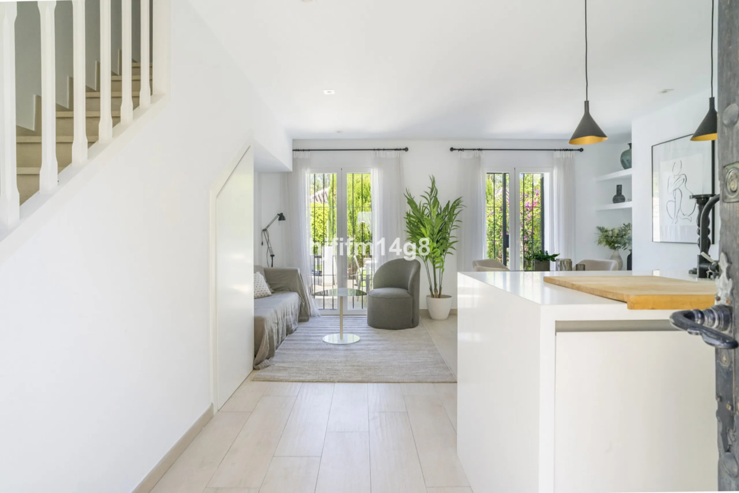 Nestled in the heart of the sought-after El Naranjal urbanisation, this delightful townhouse blends traditional Andalusian character with modern comfort. Located within a secure gated community renowned for its cobbled streets, picturesque patios, and vib