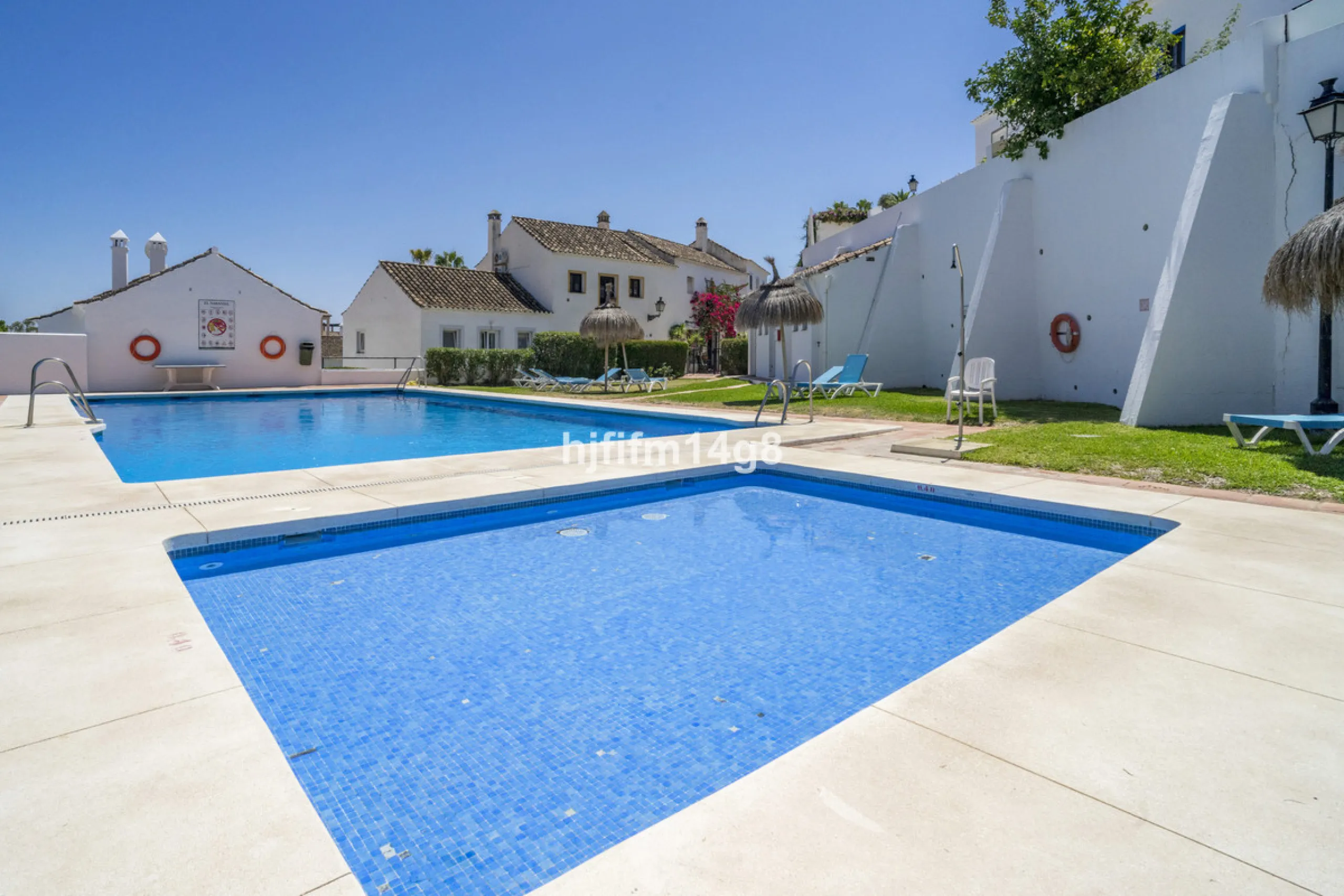 Nestled in the heart of the sought-after El Naranjal urbanisation, this delightful townhouse blends traditional Andalusian character with modern comfort. Located within a secure gated community renowned for its cobbled streets, picturesque patios, and vib
