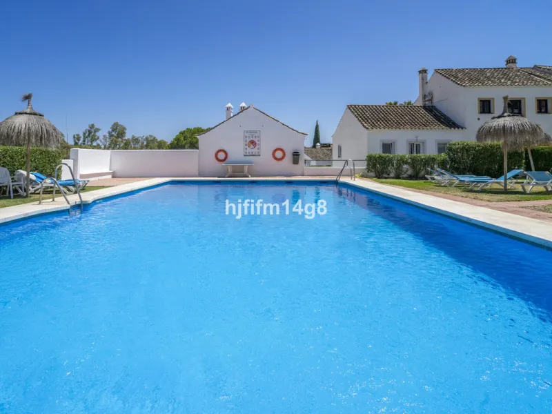 Nestled in the heart of the sought-after El Naranjal urbanisation, this delightful townhouse blends traditional Andalusian character with modern comfort. Located within a secure gated community renowned for its cobbled streets, picturesque patios, and vib