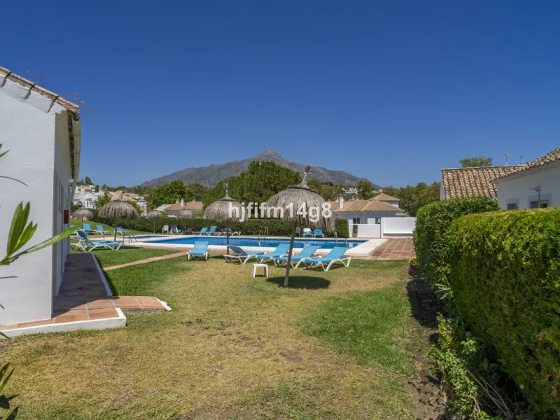 Nestled in the heart of the sought-after El Naranjal urbanisation, this delightful townhouse blends traditional Andalusian character with modern comfort. Located within a secure gated community renowned for its cobbled streets, picturesque patios, and vib