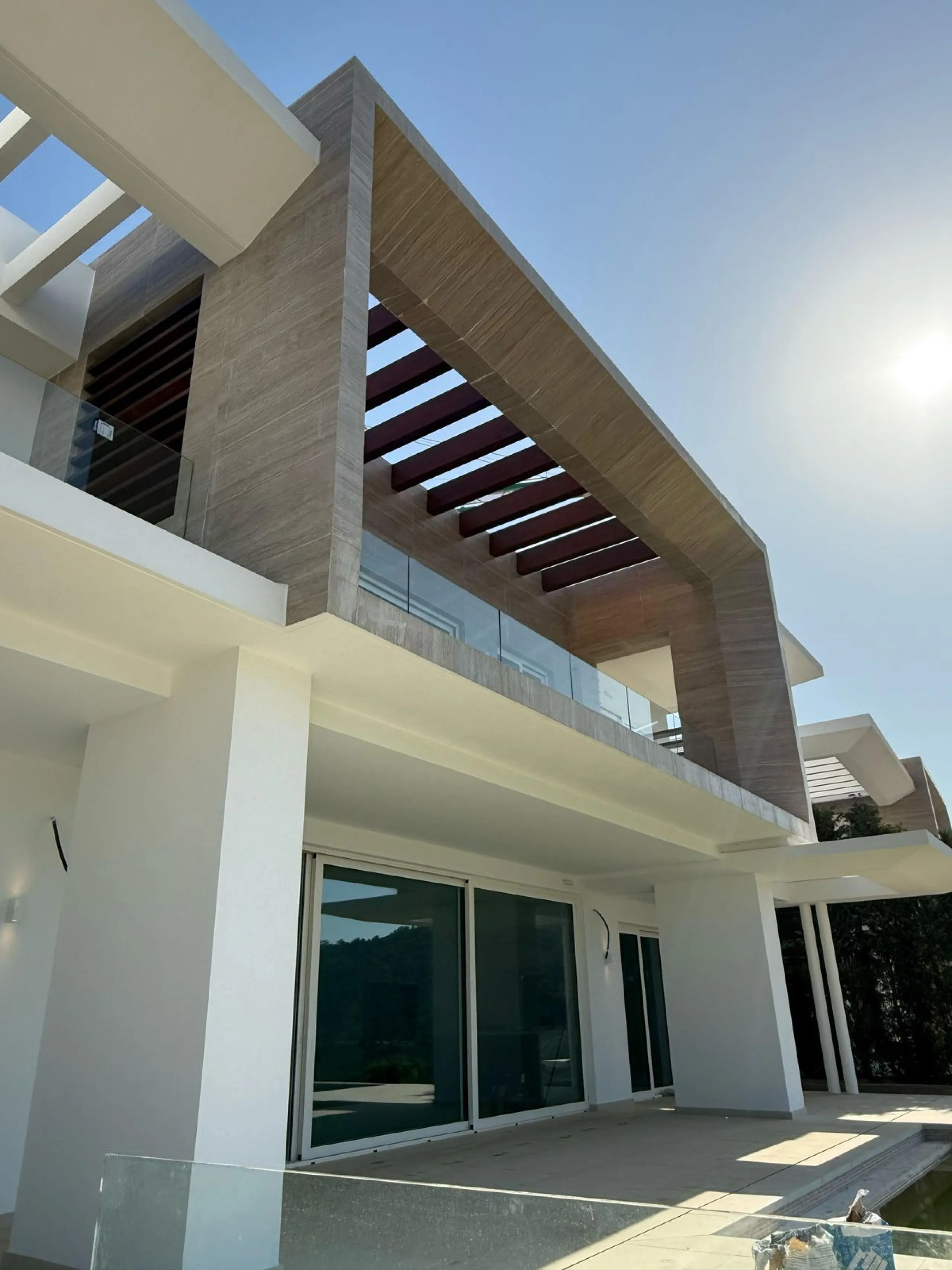 An exceptional 5+1 bedroom modern mansion for sale within a premium gated resort community in Marbella. Owners of this property will enjoy unlimited access to a purpose built owners clubhouse with indoor pool, spa, gym, lounge and restaurant - open for br