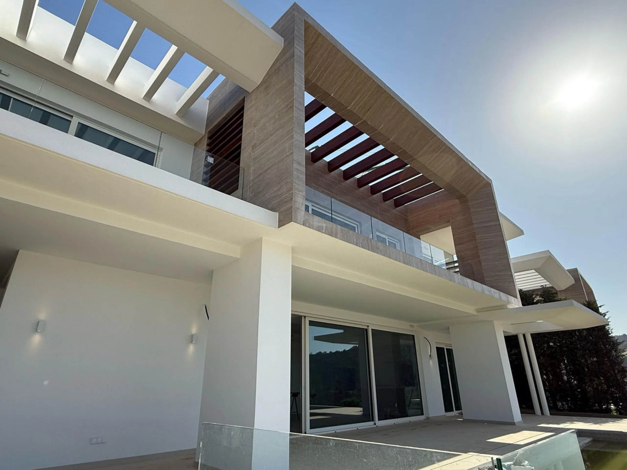 An exceptional 5+1 bedroom modern mansion for sale within a premium gated resort community in Marbella. Owners of this property will enjoy unlimited access to a purpose built owners clubhouse with indoor pool, spa, gym, lounge and restaurant - open for br