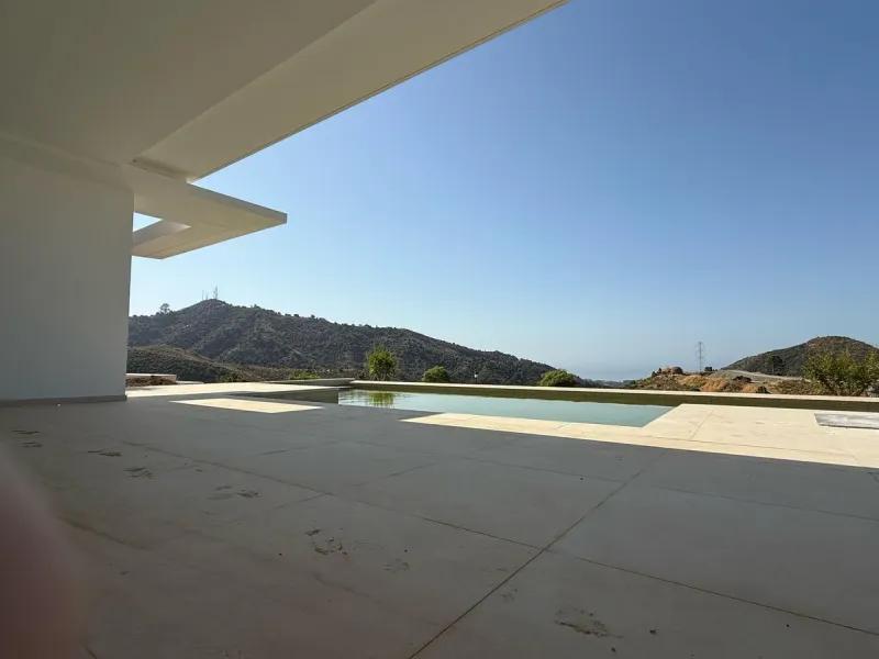 An exceptional 5+1 bedroom modern mansion for sale within a premium gated resort community in Marbella. Owners of this property will enjoy unlimited access to a purpose built owners clubhouse with indoor pool, spa, gym, lounge and restaurant - open for br