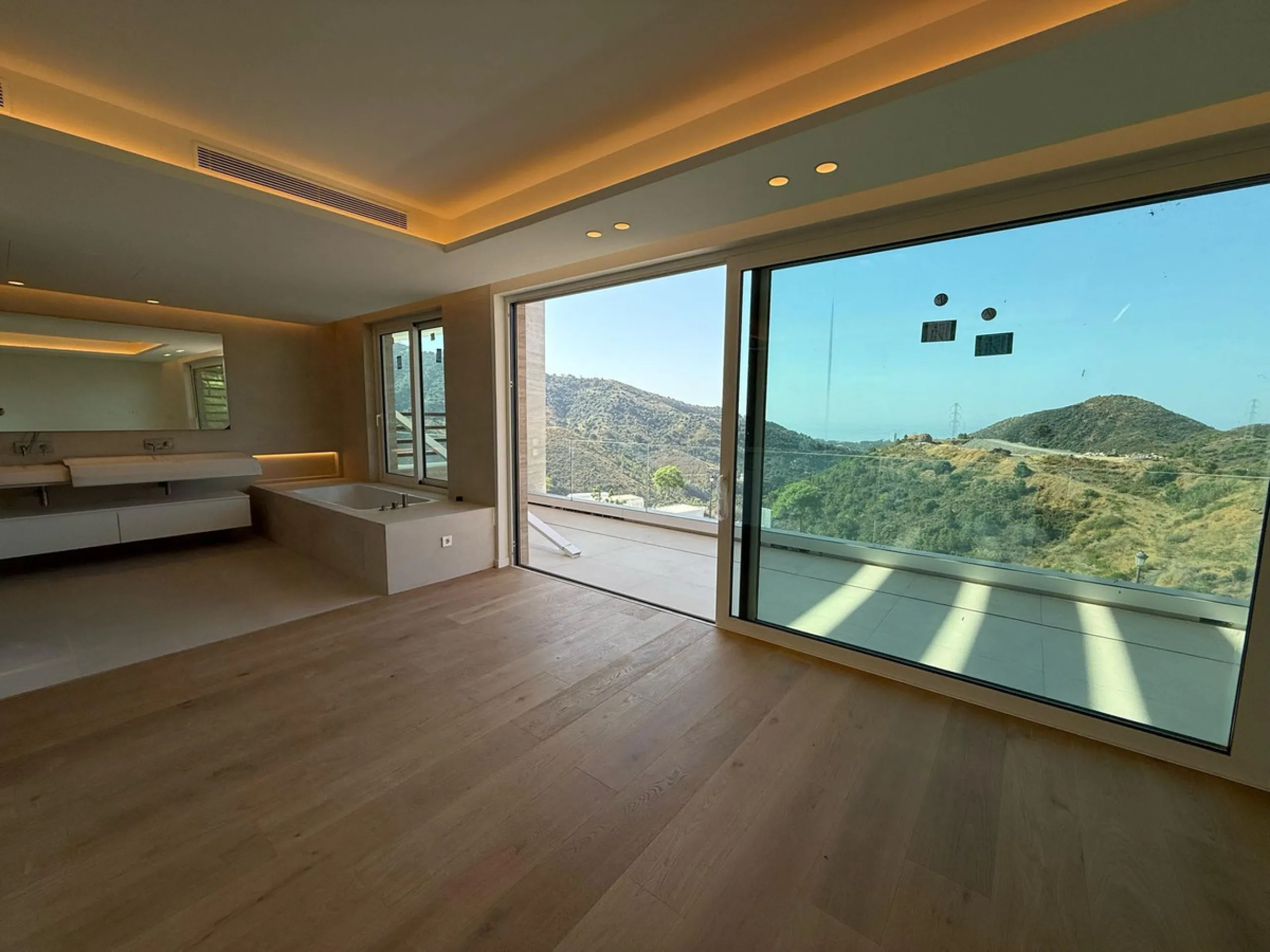 An exceptional 5+1 bedroom modern mansion for sale within a premium gated resort community in Marbella. Owners of this property will enjoy unlimited access to a purpose built owners clubhouse with indoor pool, spa, gym, lounge and restaurant - open for br