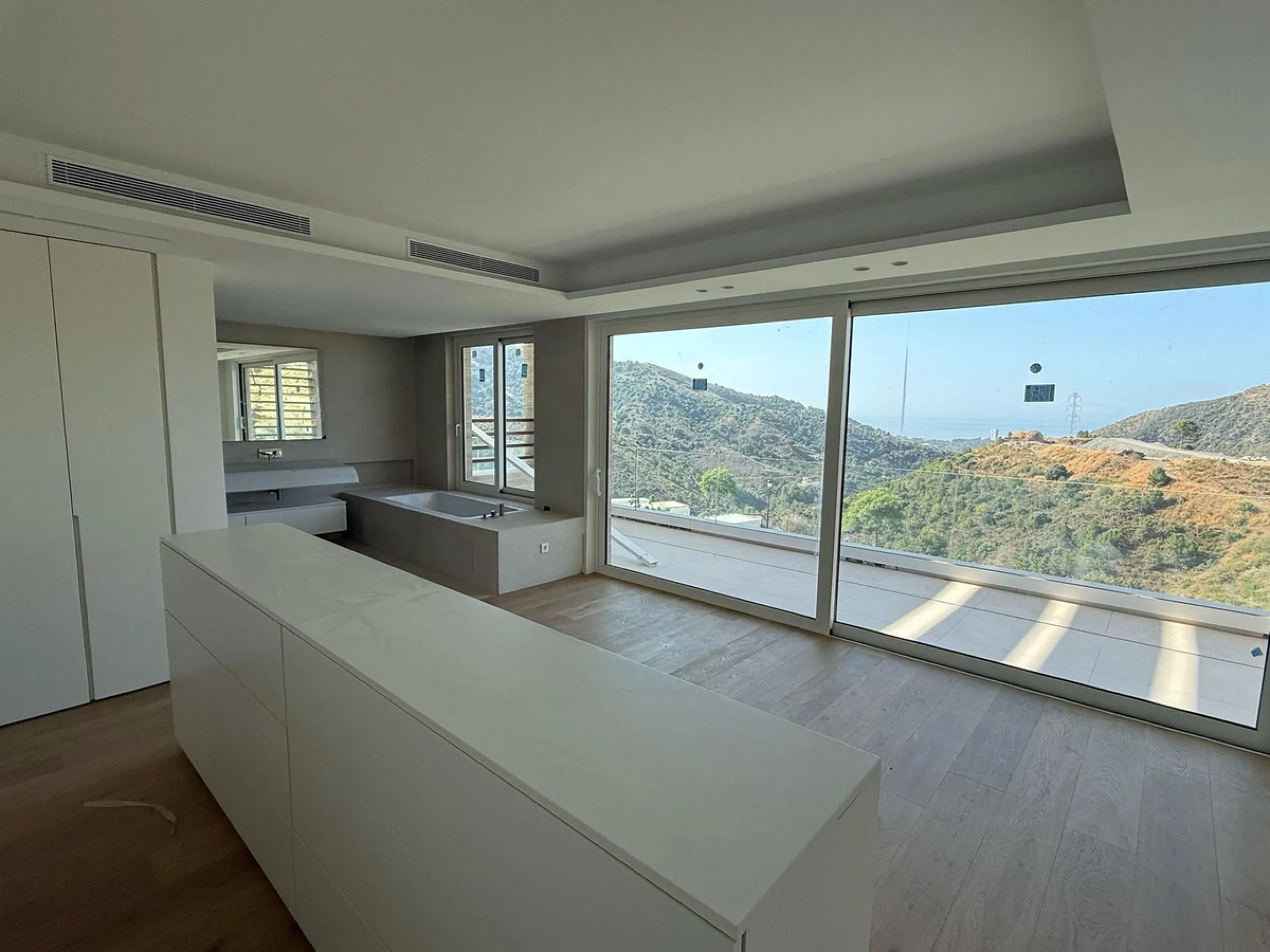 An exceptional 5+1 bedroom modern mansion for sale within a premium gated resort community in Marbella. Owners of this property will enjoy unlimited access to a purpose built owners clubhouse with indoor pool, spa, gym, lounge and restaurant - open for br