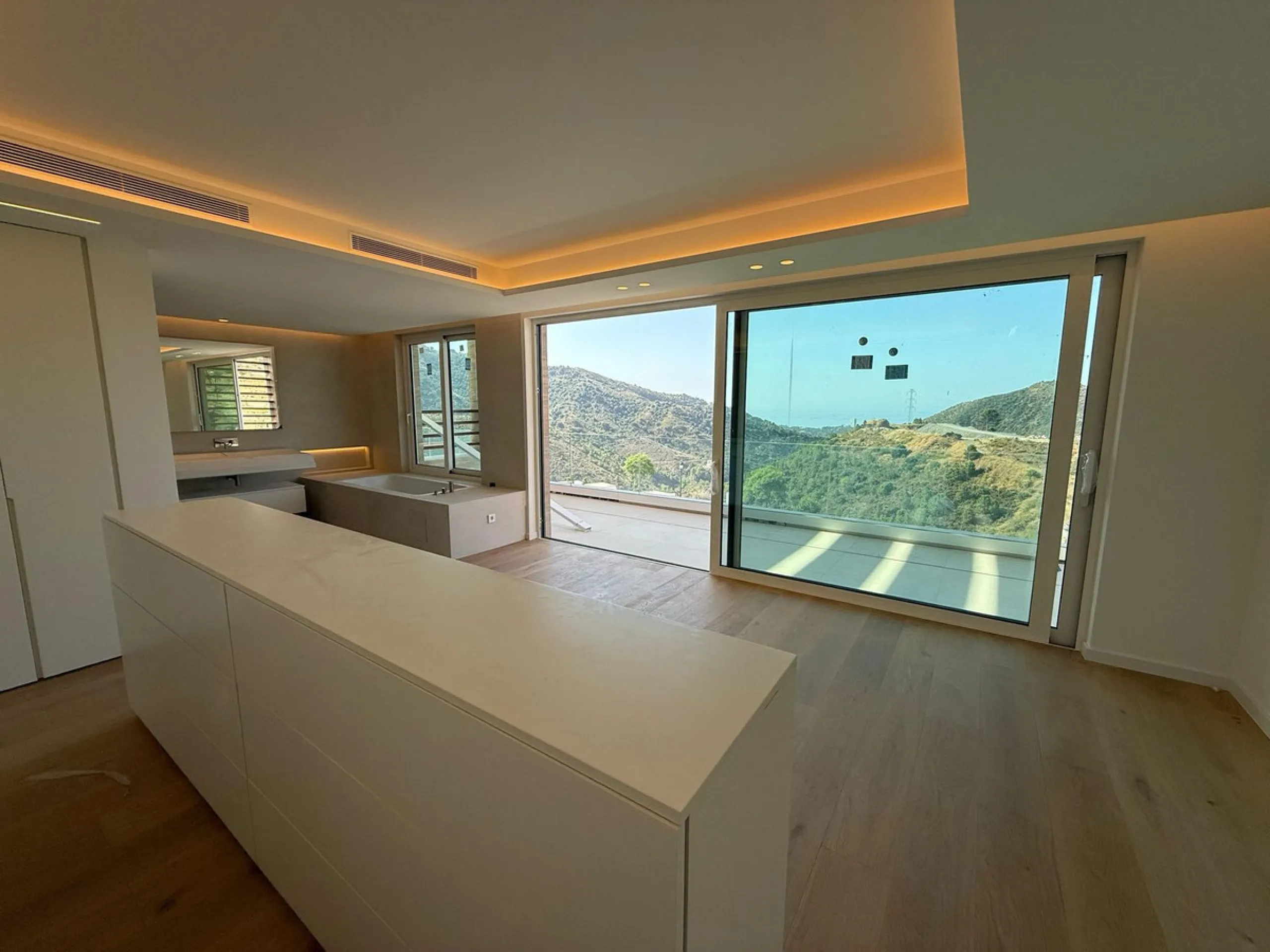 An exceptional 5+1 bedroom modern mansion for sale within a premium gated resort community in Marbella. Owners of this property will enjoy unlimited access to a purpose built owners clubhouse with indoor pool, spa, gym, lounge and restaurant - open for br
