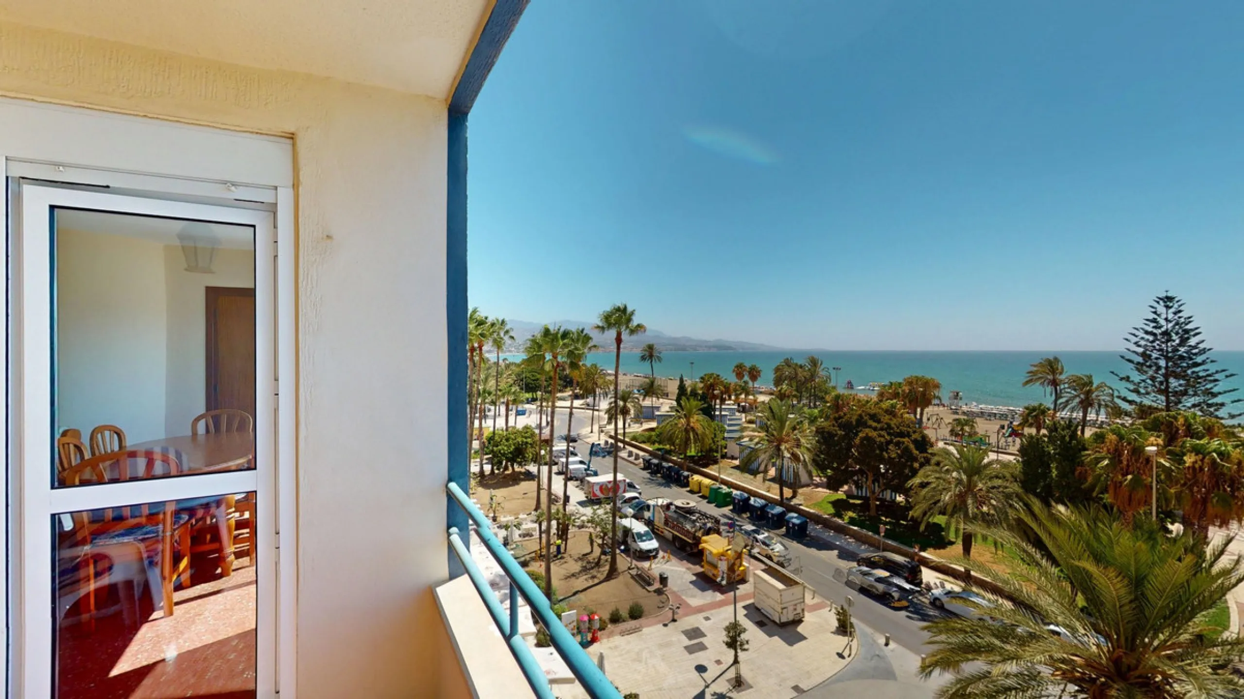 Discover this exceptional 3-bedroom apartment located on one of Torre del Mars main streets, just steps from the beach. This frontline property offers stunning panoramic sea views from all three bedrooms, with two featuring built-in wardrobes for added co
