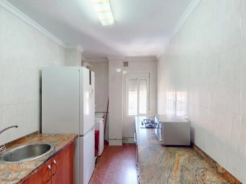 Discover this exceptional 3-bedroom apartment located on one of Torre del Mars main streets, just steps from the beach. This frontline property offers stunning panoramic sea views from all three bedrooms, with two featuring built-in wardrobes for added co