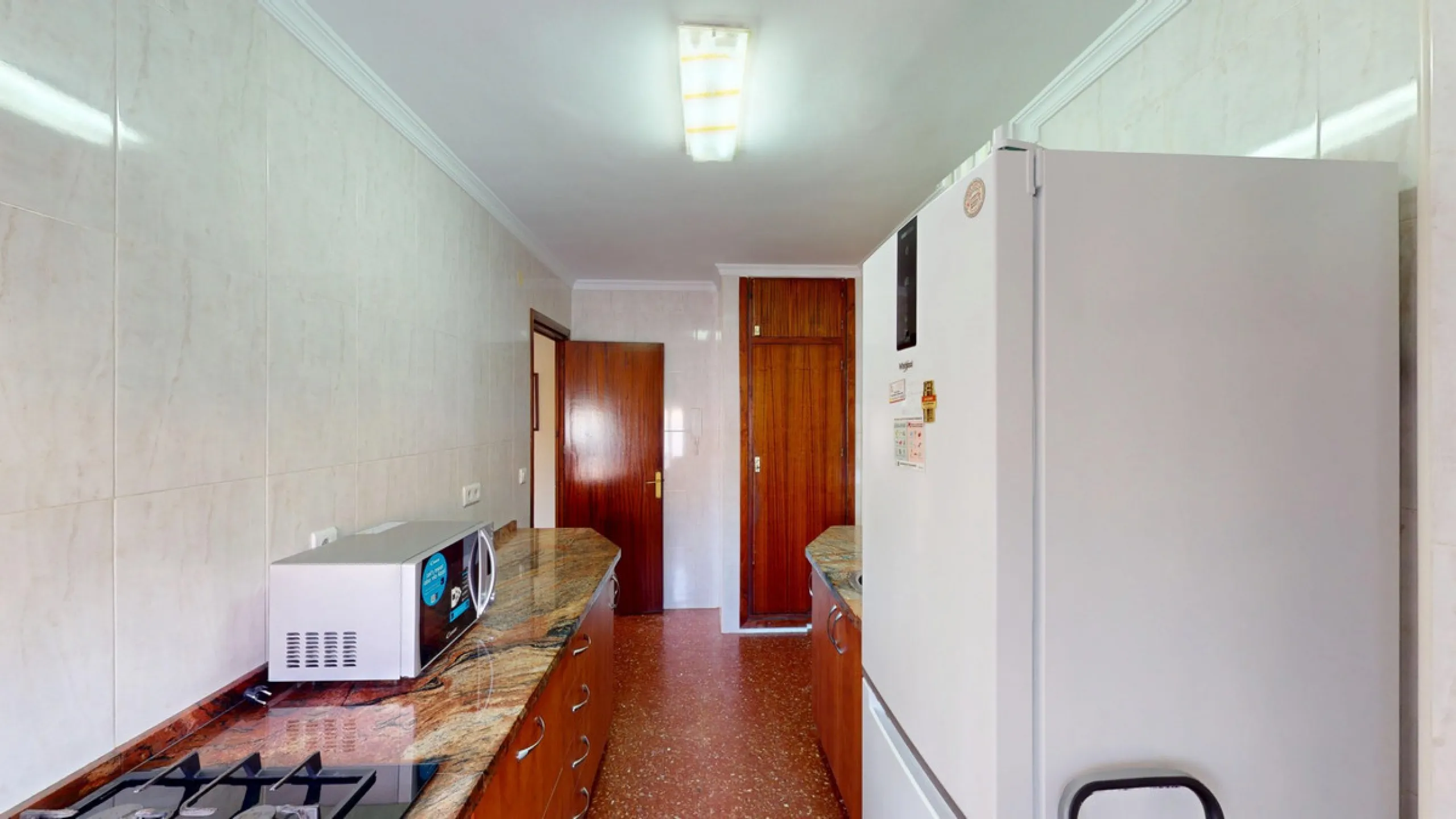 Discover this exceptional 3-bedroom apartment located on one of Torre del Mars main streets, just steps from the beach. This frontline property offers stunning panoramic sea views from all three bedrooms, with two featuring built-in wardrobes for added co