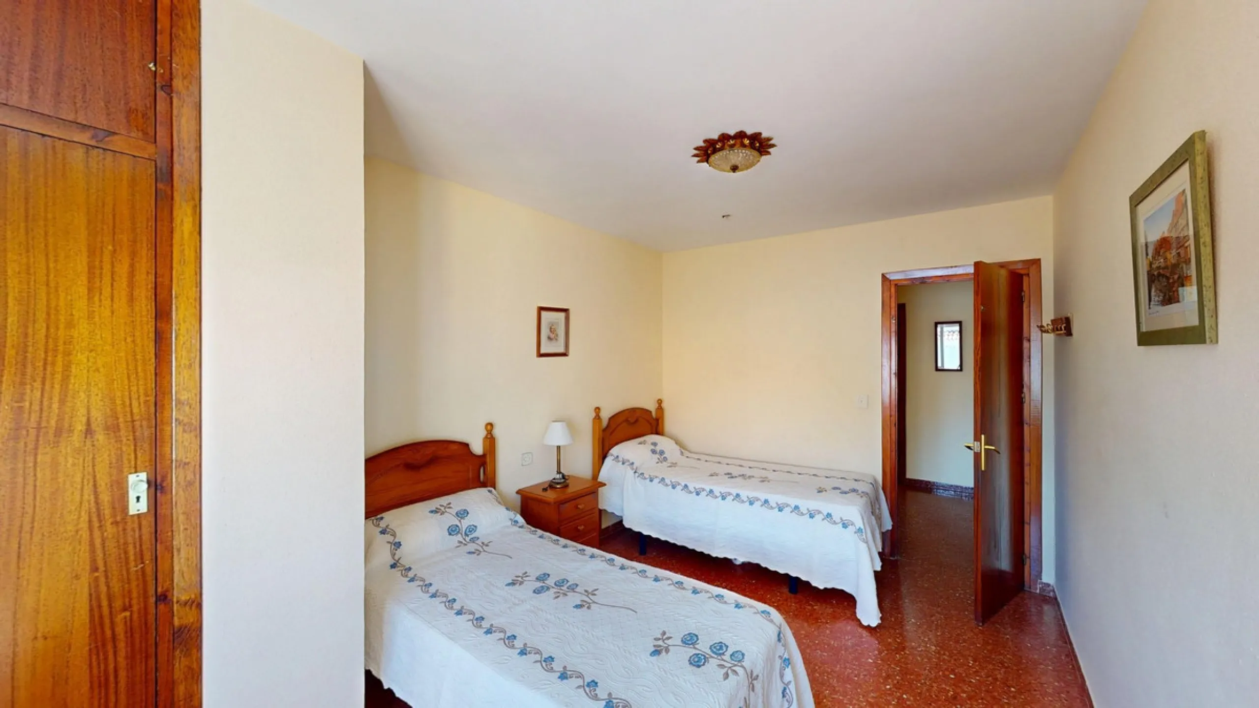 Discover this exceptional 3-bedroom apartment located on one of Torre del Mars main streets, just steps from the beach. This frontline property offers stunning panoramic sea views from all three bedrooms, with two featuring built-in wardrobes for added co