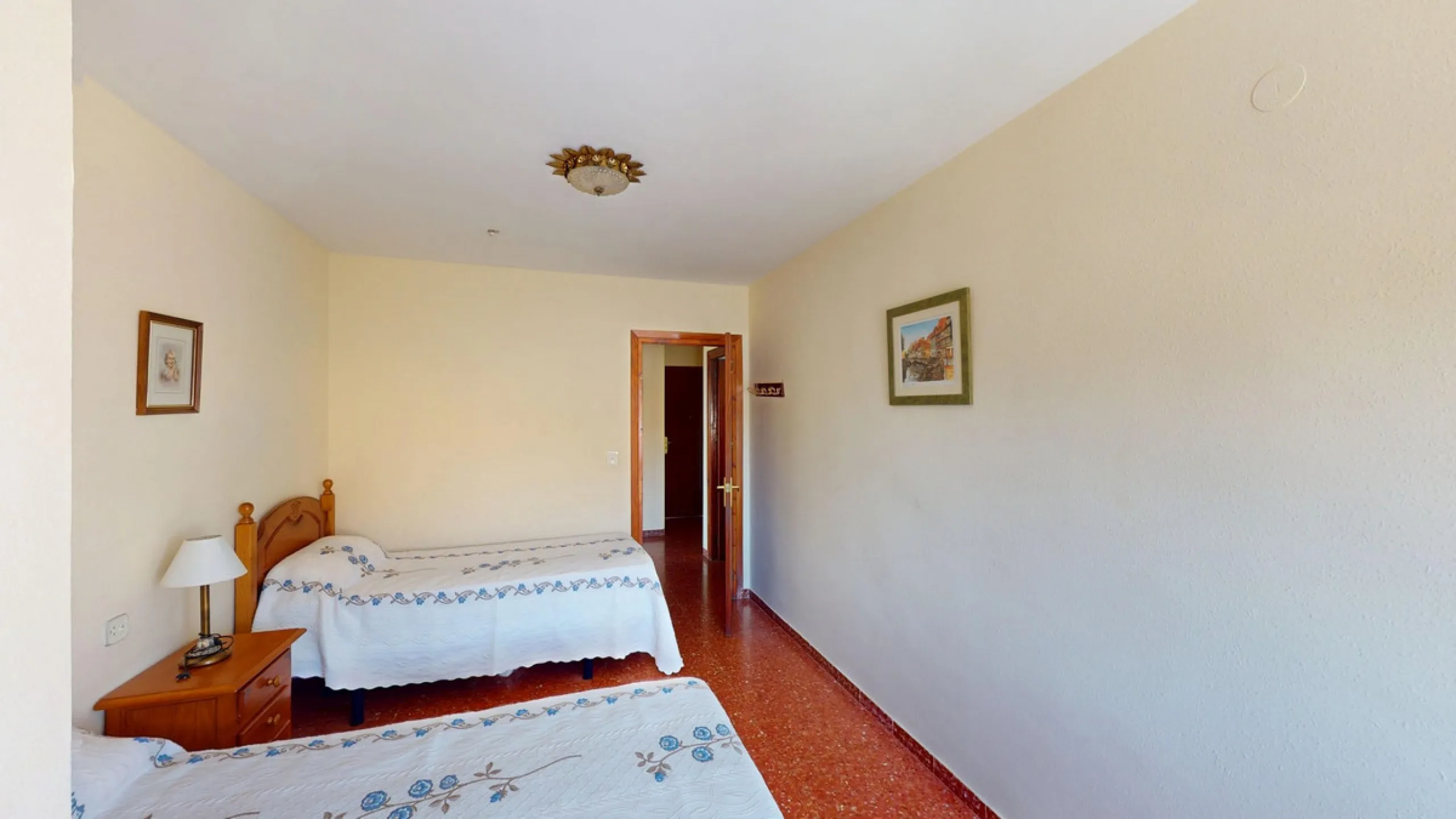 Discover this exceptional 3-bedroom apartment located on one of Torre del Mars main streets, just steps from the beach. This frontline property offers stunning panoramic sea views from all three bedrooms, with two featuring built-in wardrobes for added co