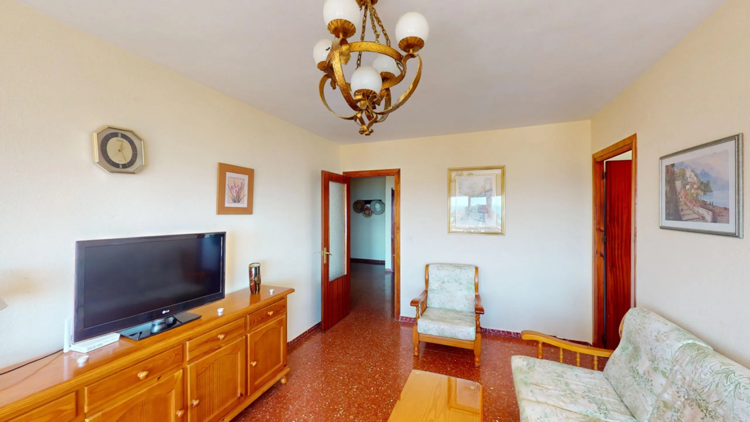 Discover this exceptional 3-bedroom apartment located on one of Torre del Mars main streets, just steps from the beach. This frontline property offers stunning panoramic sea views from all three bedrooms, with two featuring built-in wardrobes for added co