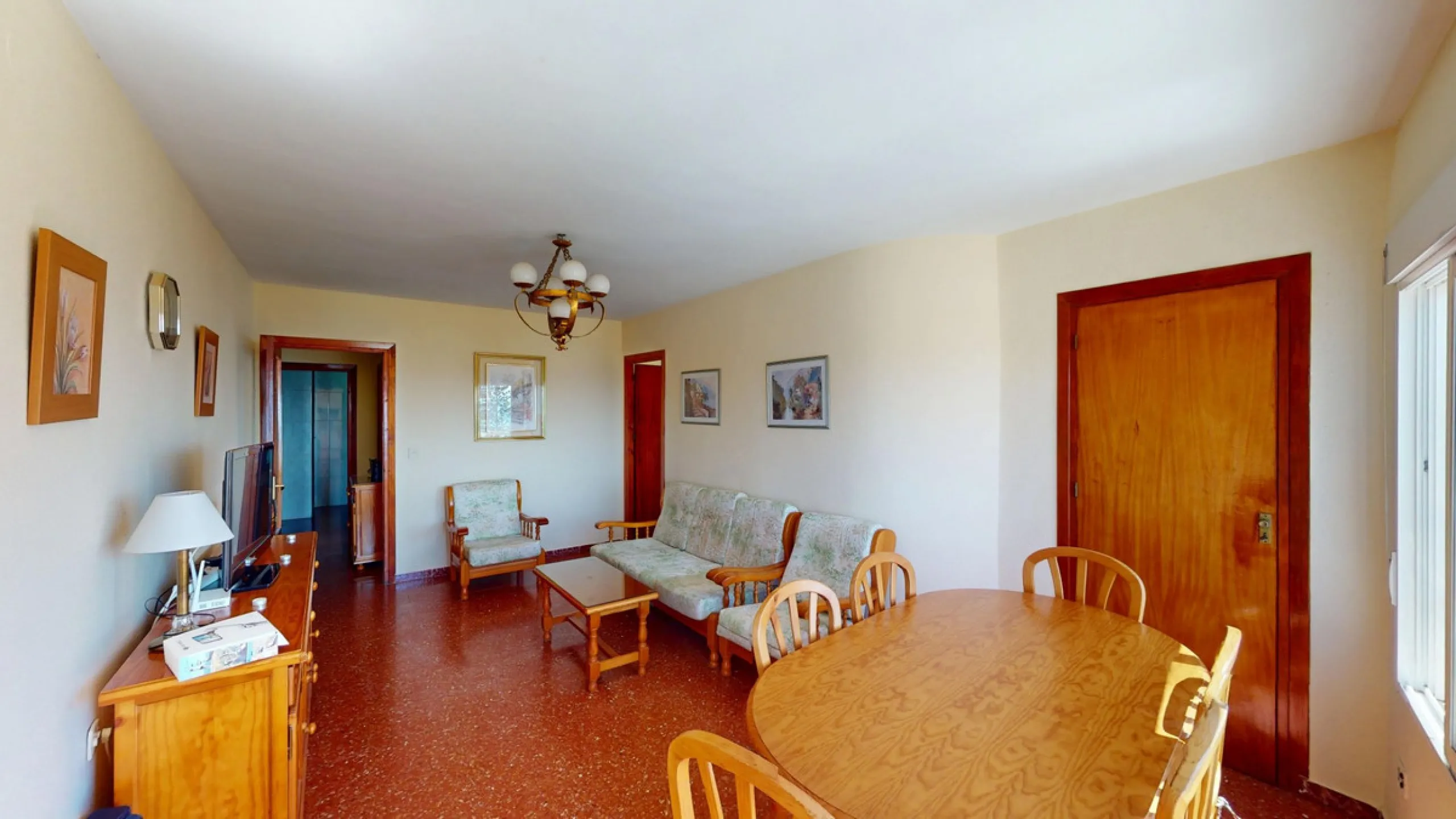 Discover this exceptional 3-bedroom apartment located on one of Torre del Mars main streets, just steps from the beach. This frontline property offers stunning panoramic sea views from all three bedrooms, with two featuring built-in wardrobes for added co