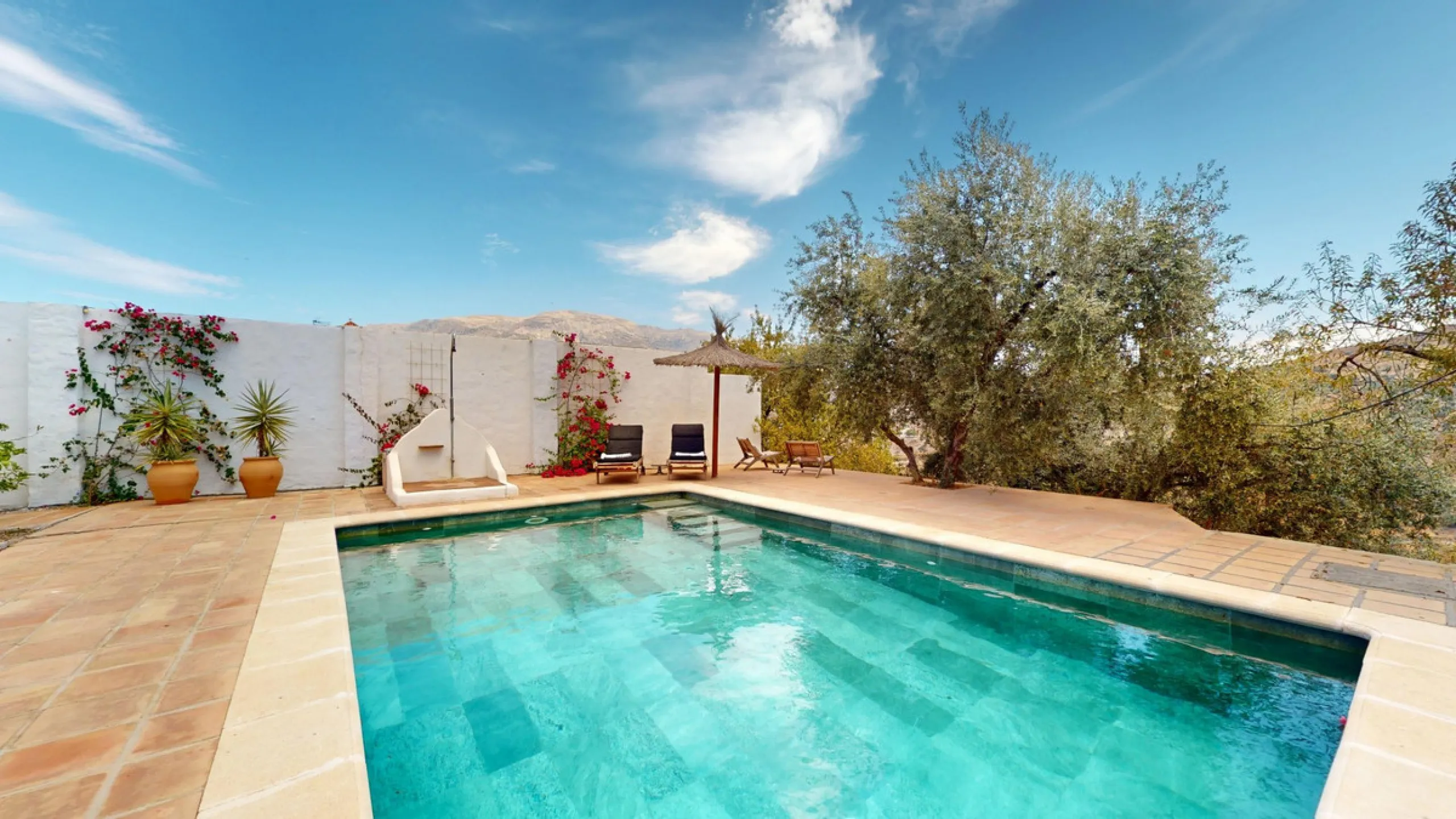 Nestled in the hills of Arenas, Málaga, this enchanting cortijo is more than just a home it's a Mediterranean haven full of character, peace, and possibility. Divided into three separate apartments, its perfectly suited for use as a charming B&B or a spac
