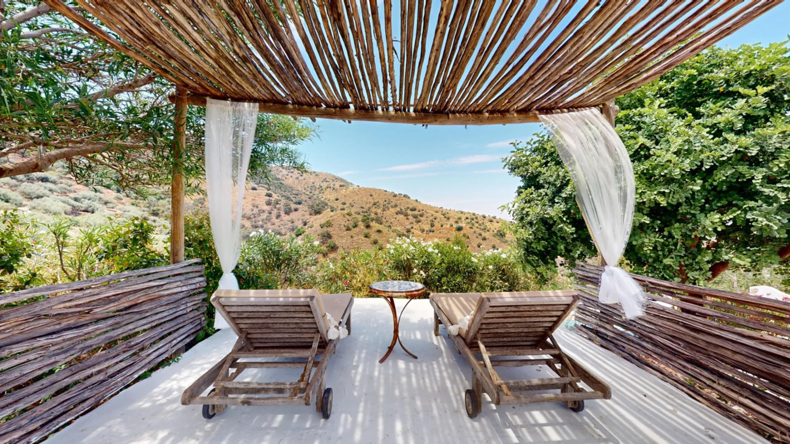 Nestled in the hills of Arenas, Málaga, this enchanting cortijo is more than just a home it's a Mediterranean haven full of character, peace, and possibility. Divided into three separate apartments, its perfectly suited for use as a charming B&B or a spac