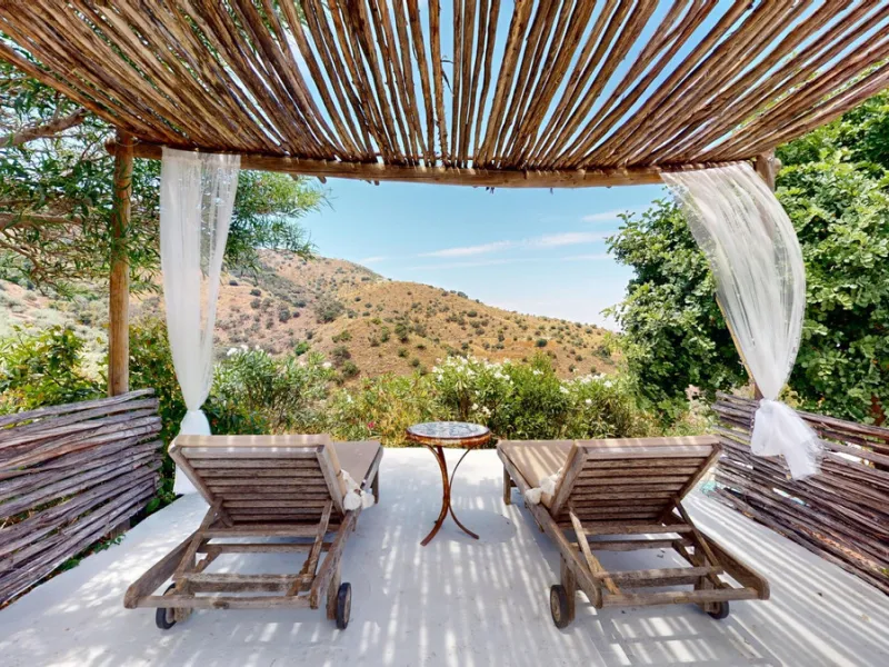 Nestled in the hills of Arenas, Málaga, this enchanting cortijo is more than just a home it's a Mediterranean haven full of character, peace, and possibility. Divided into three separate apartments, its perfectly suited for use as a charming B&B or a spac