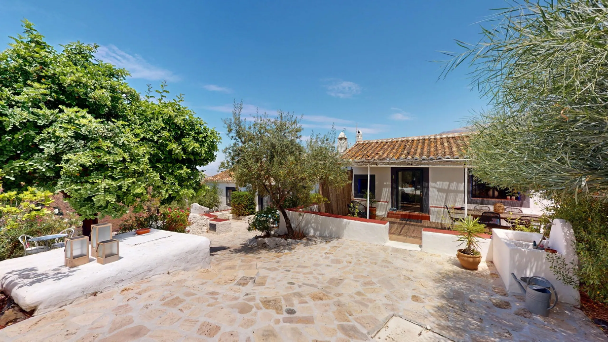 Nestled in the hills of Arenas, Málaga, this enchanting cortijo is more than just a home it's a Mediterranean haven full of character, peace, and possibility. Divided into three separate apartments, its perfectly suited for use as a charming B&B or a spac