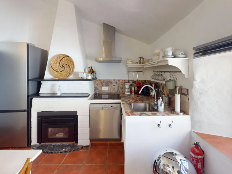 Nestled in the hills of Arenas, Málaga, this enchanting cortijo is more than just a home it's a Mediterranean haven full of character, peace, and possibility. Divided into three separate apartments, its perfectly suited for use as a charming B&B or a spac