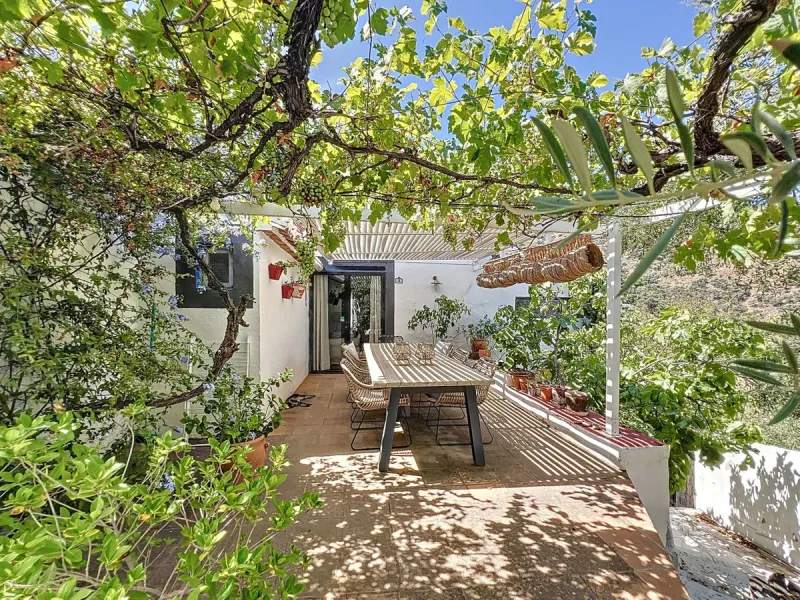 Nestled in the hills of Arenas, Málaga, this enchanting cortijo is more than just a home it's a Mediterranean haven full of character, peace, and possibility. Divided into three separate apartments, its perfectly suited for use as a charming B&B or a spac